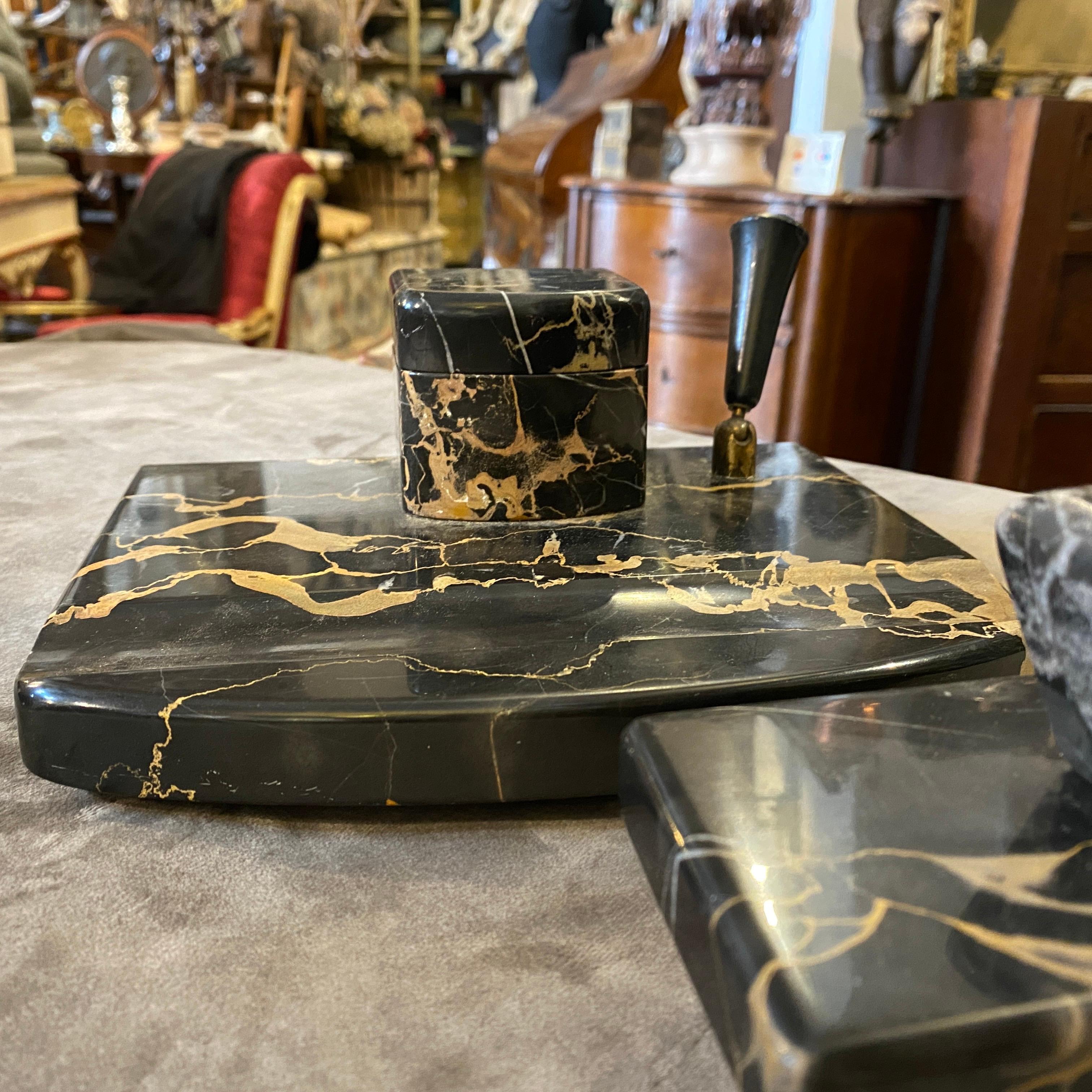 Very precious Italian inkwell and signature pad with original paper. It's made with very rare portoro marble, particular for its black with brown and gold veins. Price is for the complete set. The set is a luxurious and exquisite piece of functional