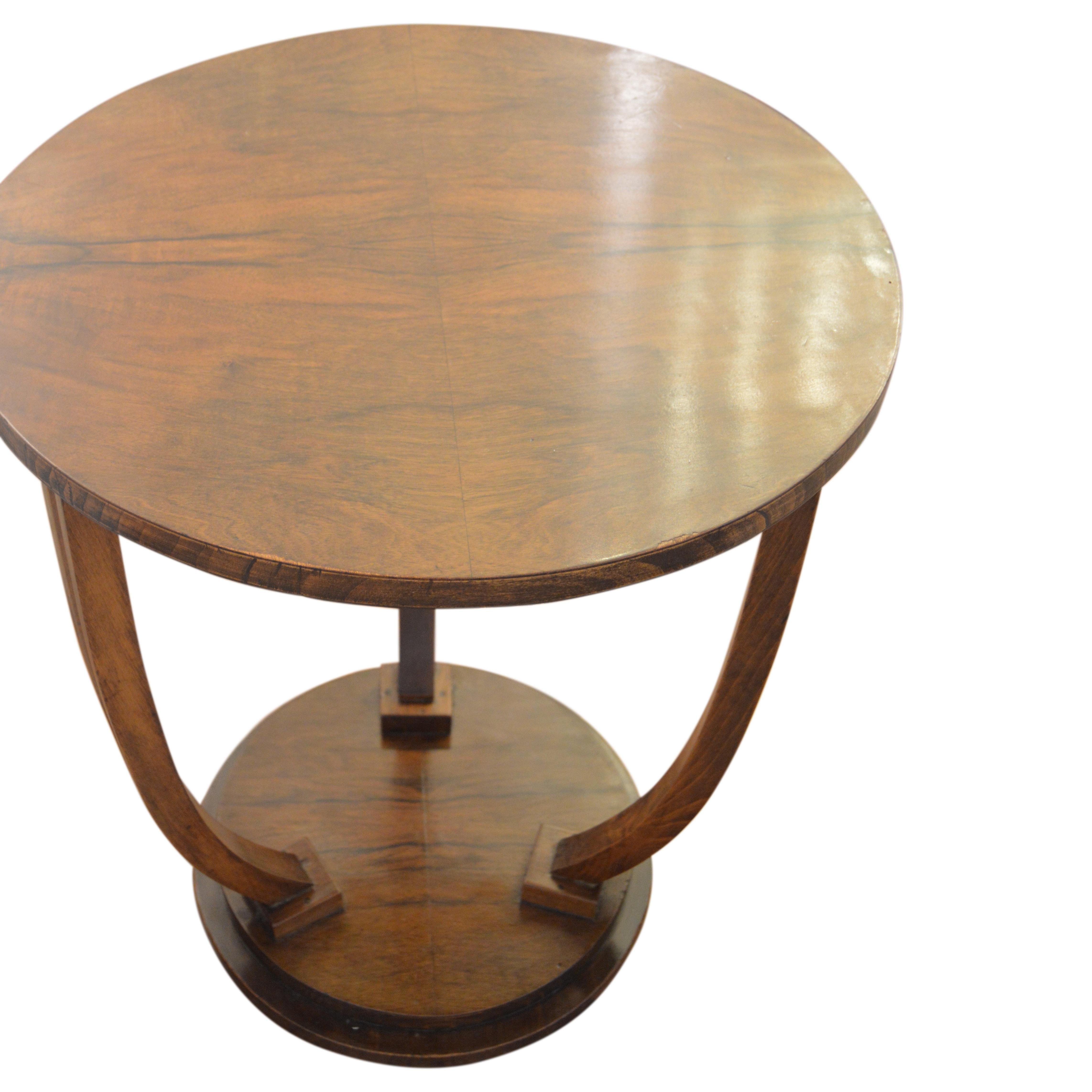 Beautiful Art Deco table from the 18th century perfect for the side of a sofa, in between chairs or bedside table.