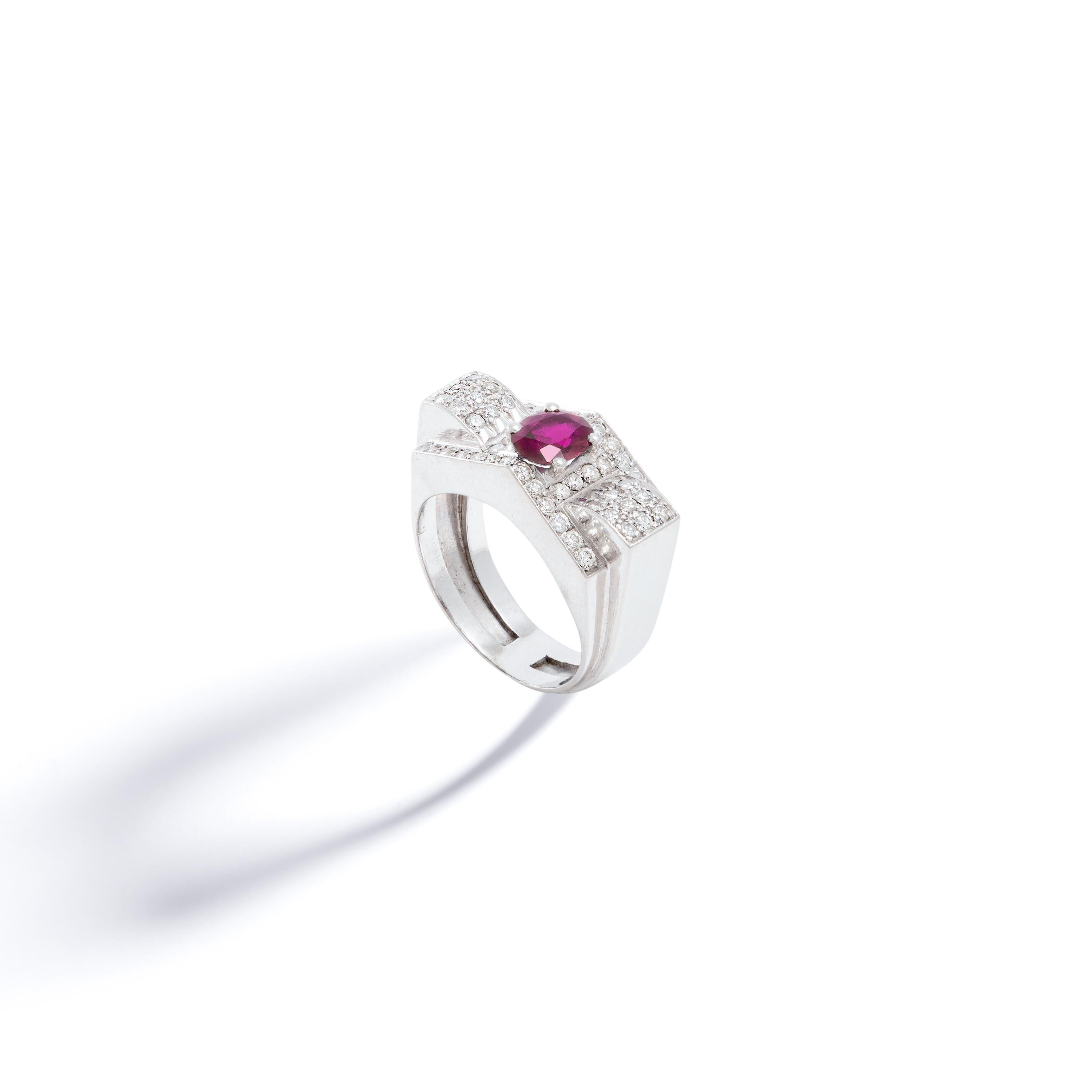 This exquisite chevaliere ring showcases a typical Art Deco design and is crafted in platinum. The centerpiece of the ring is a stunning 1.20 carat natural ruby, which is surrounded by sparkling diamonds.

The combination of the vibrant ruby and the