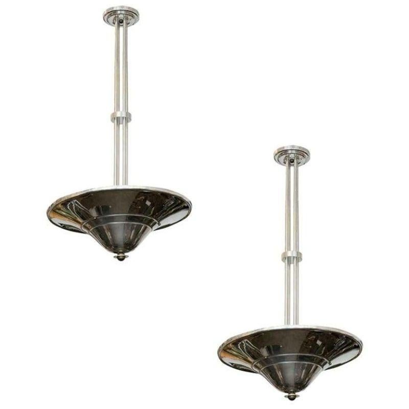 American Art Deco era chrome saucer ceiling lamp with bronze end cap and polished aluminum stem. The lamp was a 43