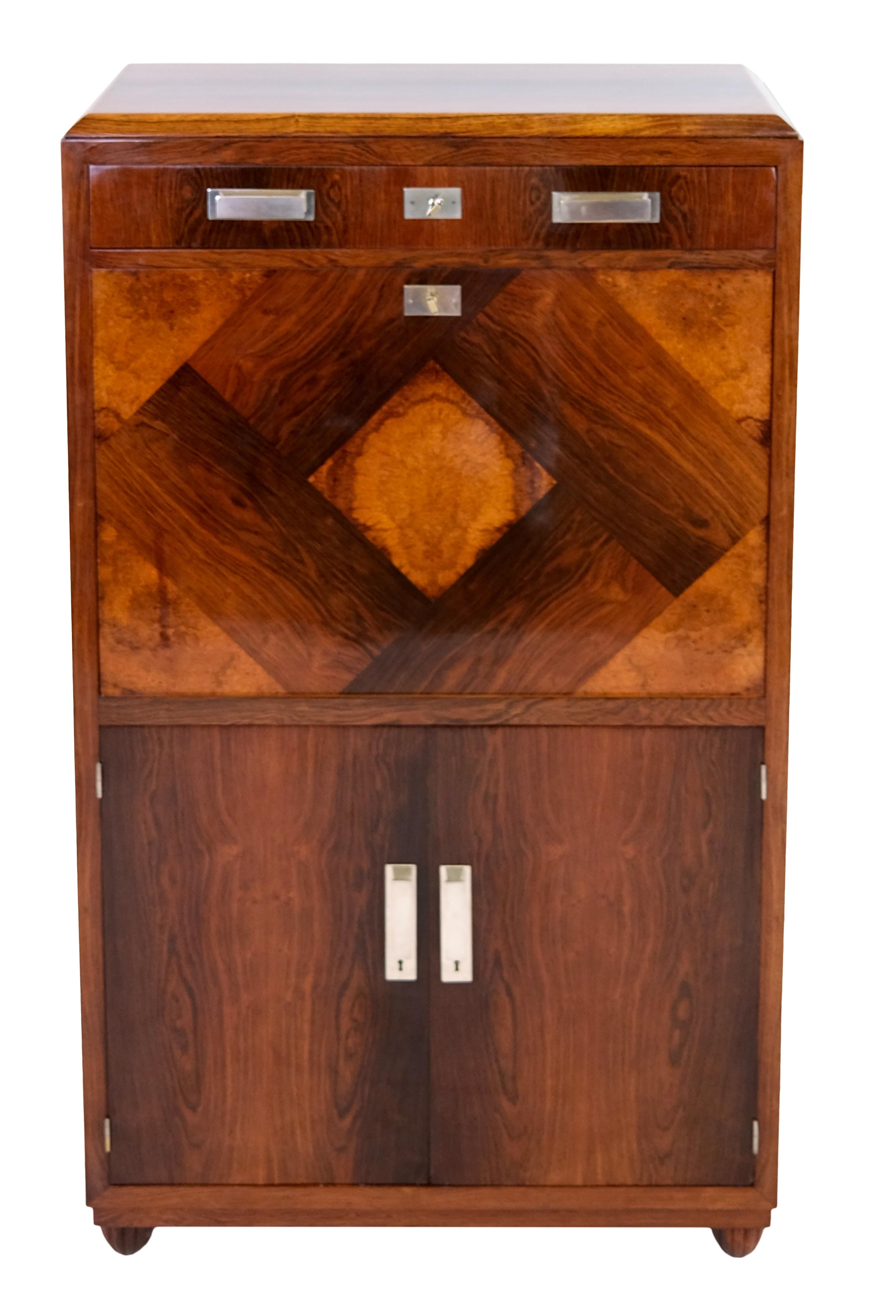 Secretary
wooden body, shellac hand polished
probably stained ash

One drawer can be locked/unlocked by a hidden locking mechanism.

Original Art Deco, France 1930s

Dimensions:
Width: 85 cm
height: 145 cm
Depth: 40 cm. 