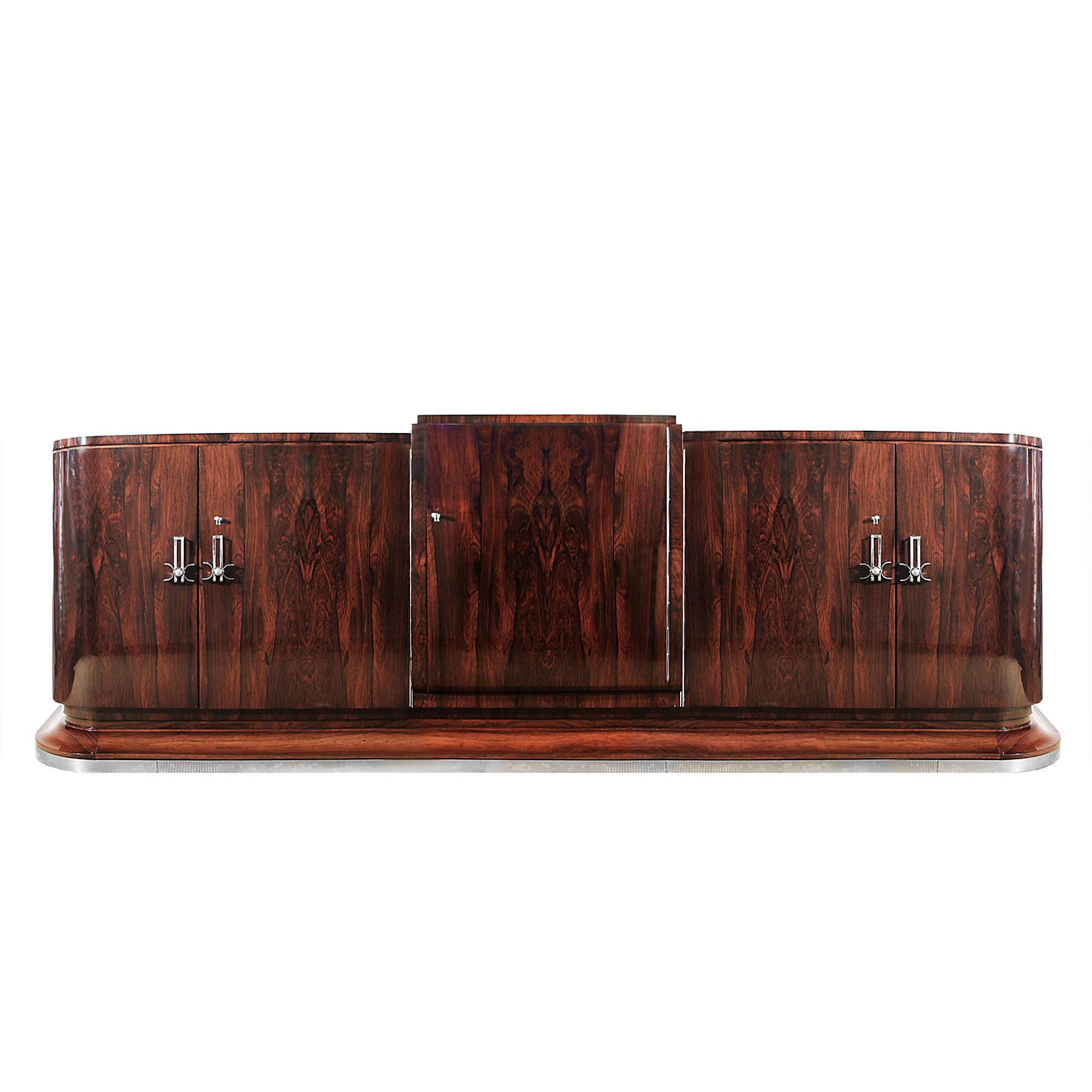 Exceptional Art Deco sideboard, mahogany veneer, 3 blocks, in the middle 5 cutlery drawers in sycamore with satin nickel plated metal handles, on both sides 3 shelves, ash wood veneer and ebony marquetry, doors with mahogany veneer inside, solid