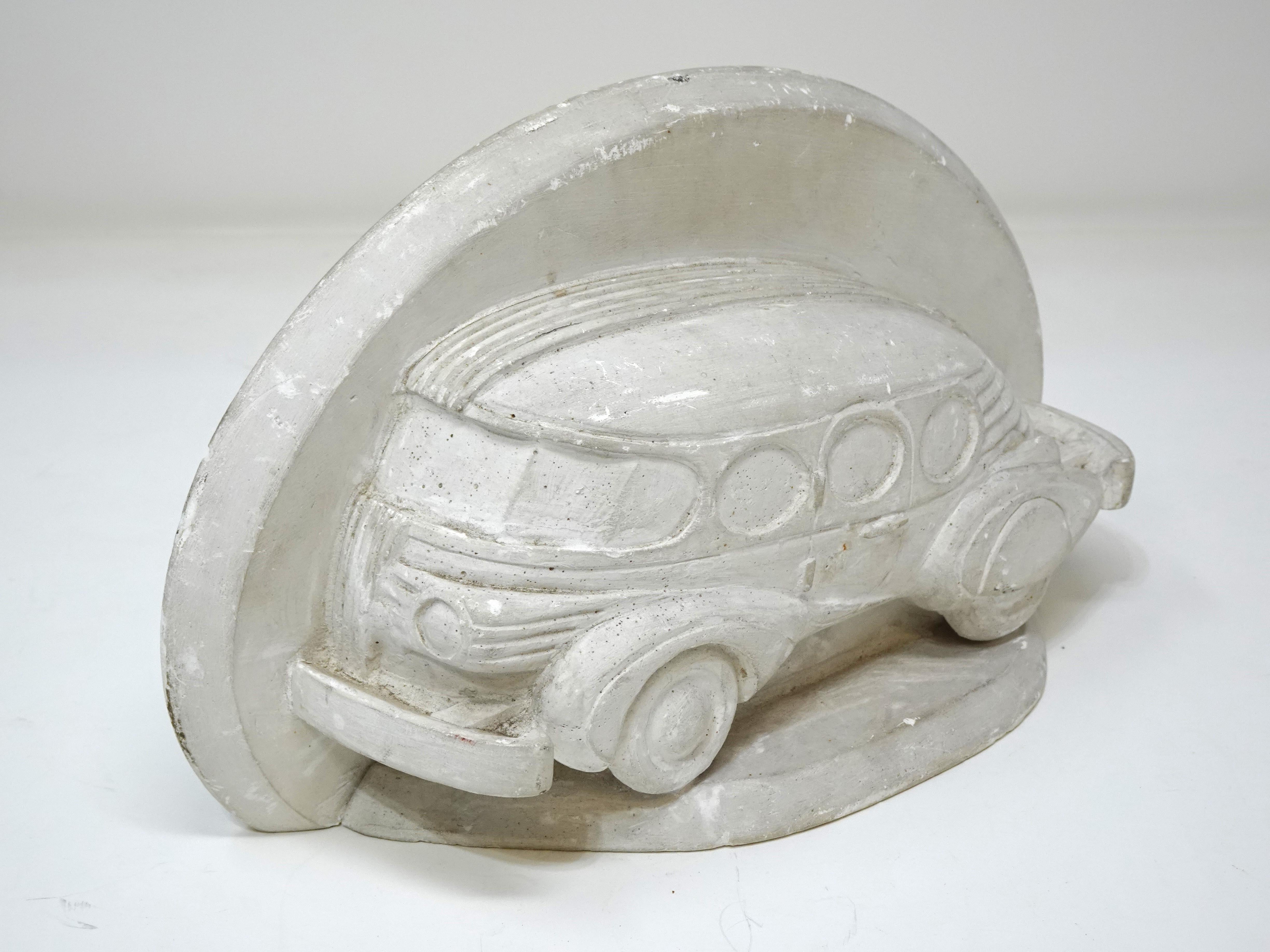 A plaster design study attributed to an artist designer at the Hill Auto Body Metal company based in Cincinnati Ohio . The company specialized in streamline equipment for airplanes and would periodically go into the automotive field with race cars