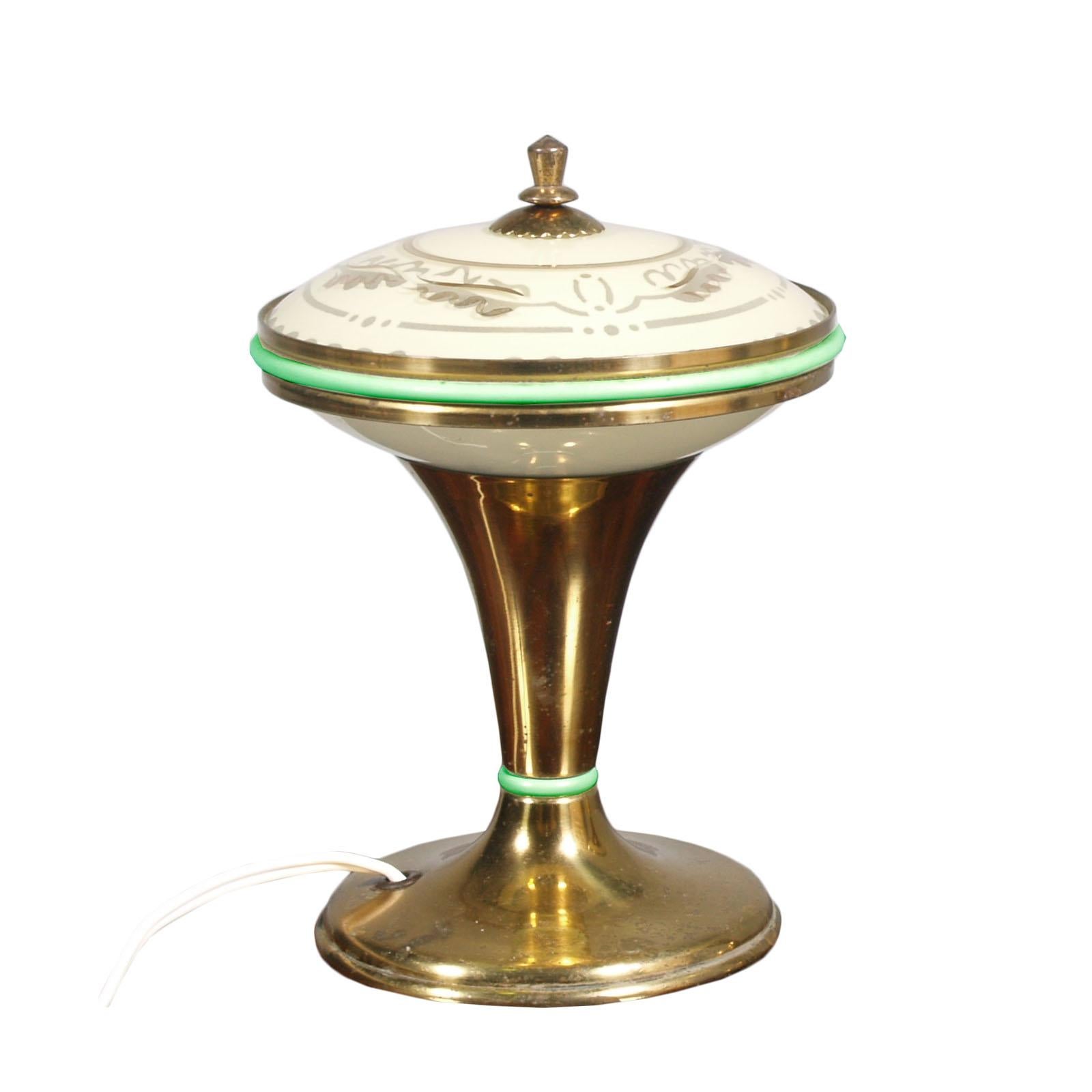 Midcentury Art Deco table lamps in gilt brass and Murano opaline glass the one below, and with gold thread and pastel green enamel the one above.
Overhauled and functioning electrical system.
They can be sold separately
  