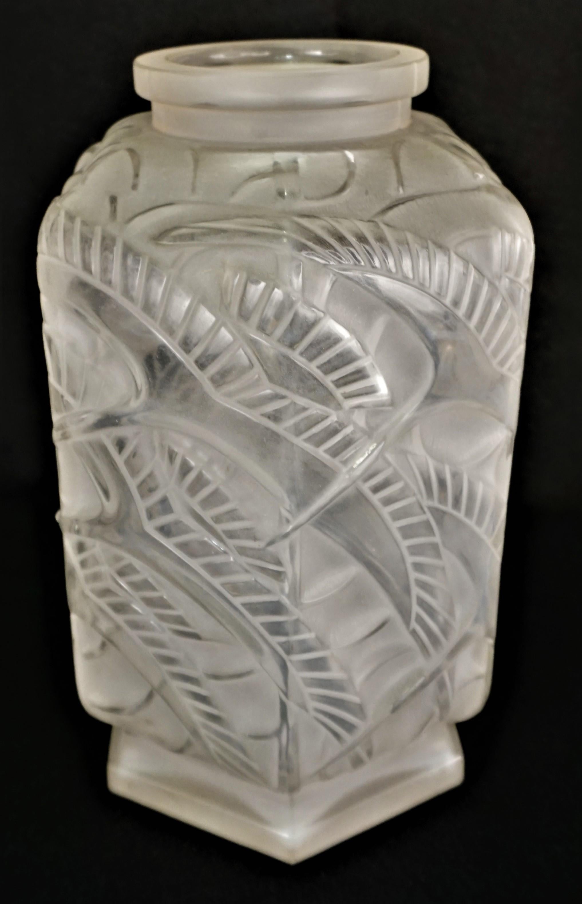 Clear frost glass vase with high light polished flying bids by Pierre D'Avesn
Pierre D'Avesn, worked for Lalique, Datum and Sevres.

 