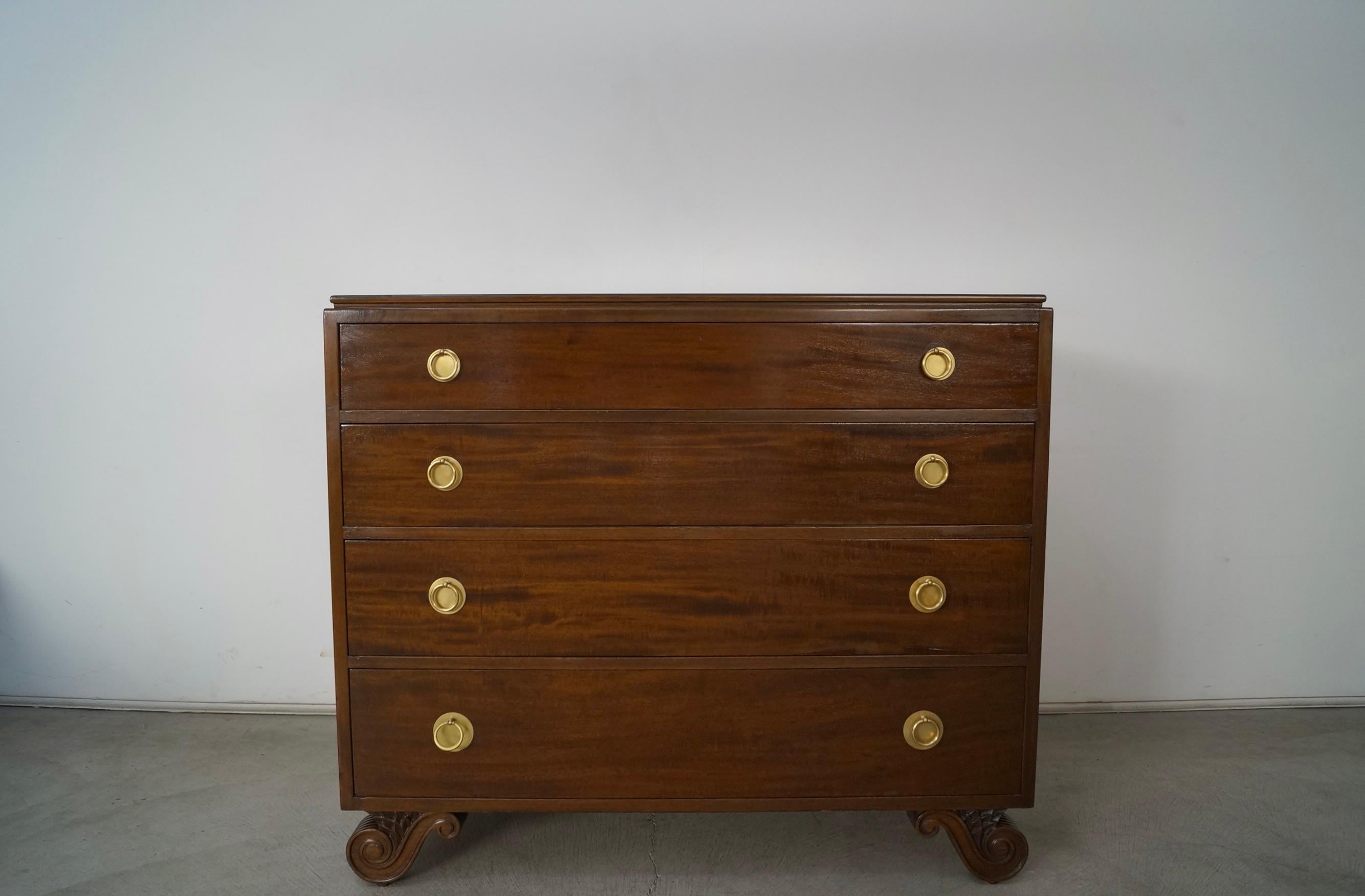 Antique 1920s / 1930s dresser for sale. A very beautiful dresser that has stood the test of time, and manufactured by Johnson Furniture. It's made of mahogany is a dark walnut finish, and has solid brass pulls with solid brass backdrop plates that