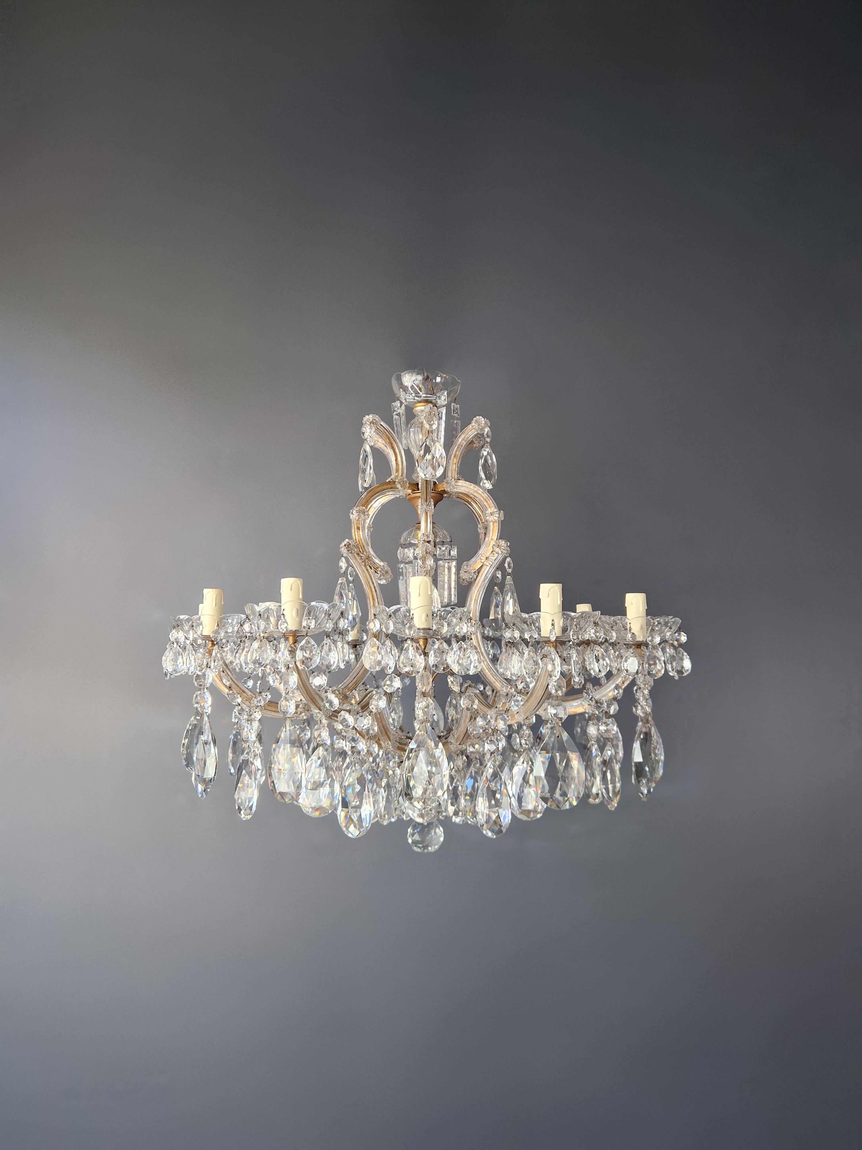 For sale is a stunning antique chandelier that has been professionally restored in Berlin. The chandelier has been meticulously re-wired and is now ready to be hung. Not a single crystal is missing, and the cabling and sockets have been completely
