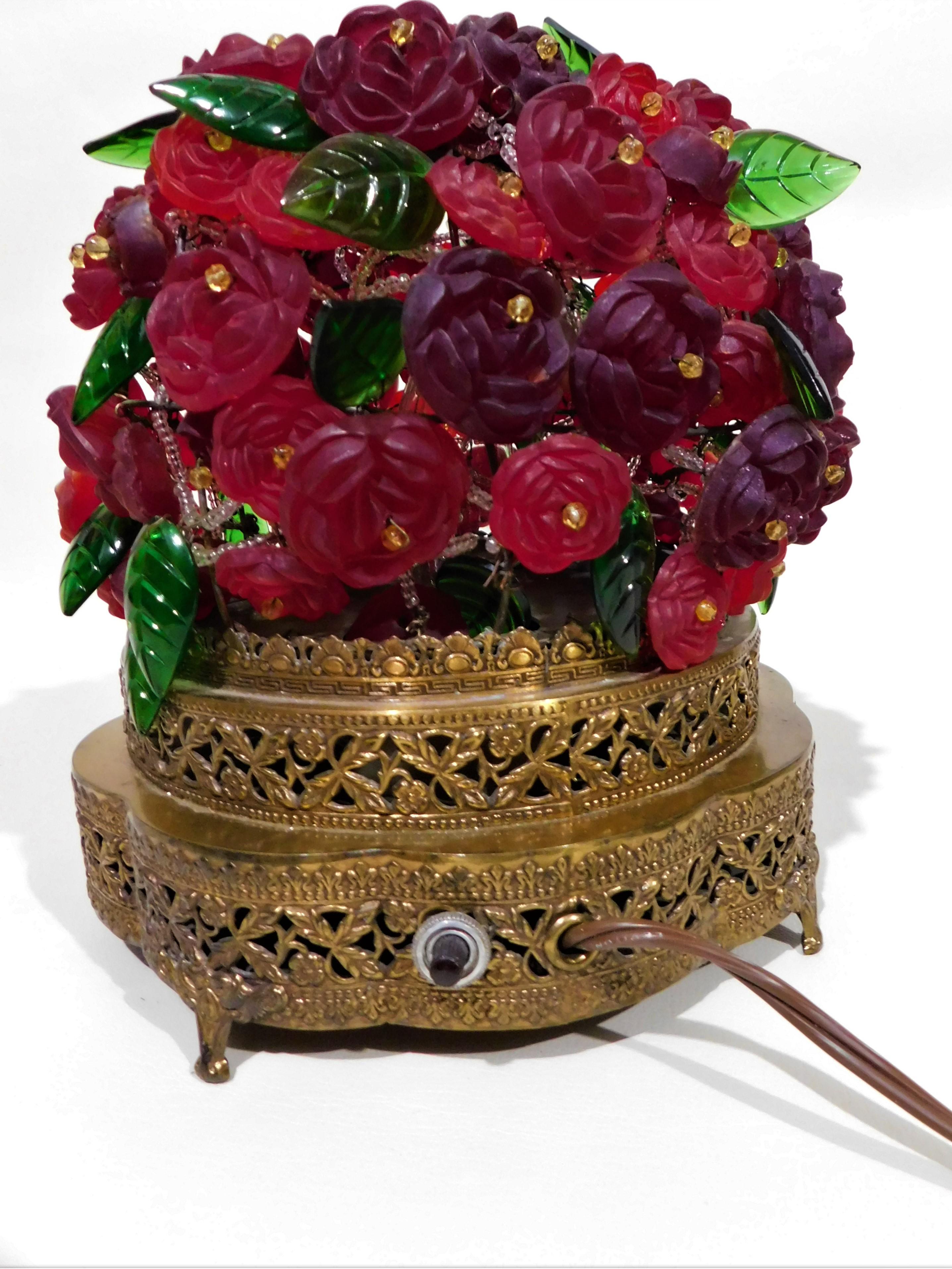 Beautiful, circa 1930 Czech Art Novena to Art Deco colored crystal or cut glass with red and violet flowers and green leaves themed table light. Brass bottom base with original on off switch on side and a rotary on off switch.