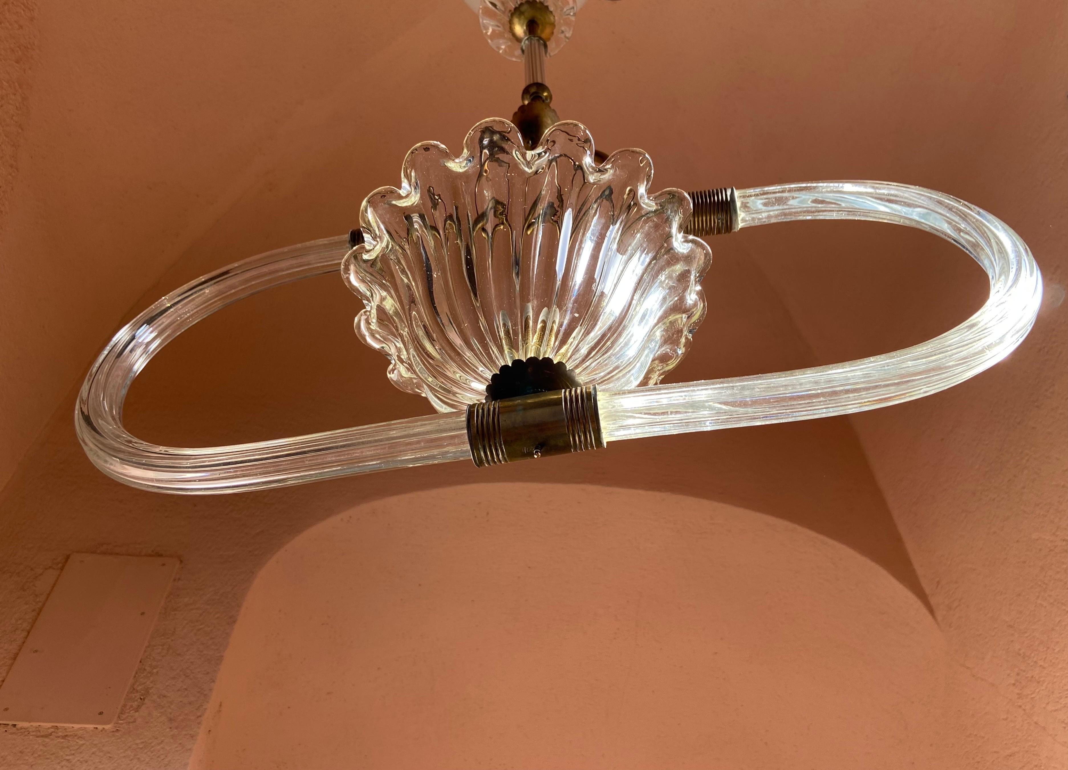 Magnificent ceiling light designed and manufactured by Barovier & Toso. Sober and elegant shapes, an authentic jewel from Murano.
The base is all in brass. 1 light bulbs.
The lamp has been professionally re-wired.

Details
Dimensions: Height: 85 cm