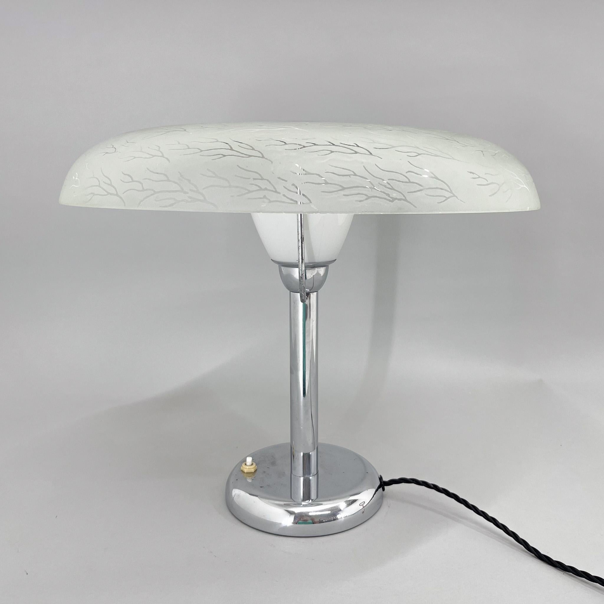 Bauhaus or functionalist large table lamp made of chrome and beautiful, unique glass lamp shade. 
Restored, rewired. Bulb: 1 x E25-E27. US plug adapter included.