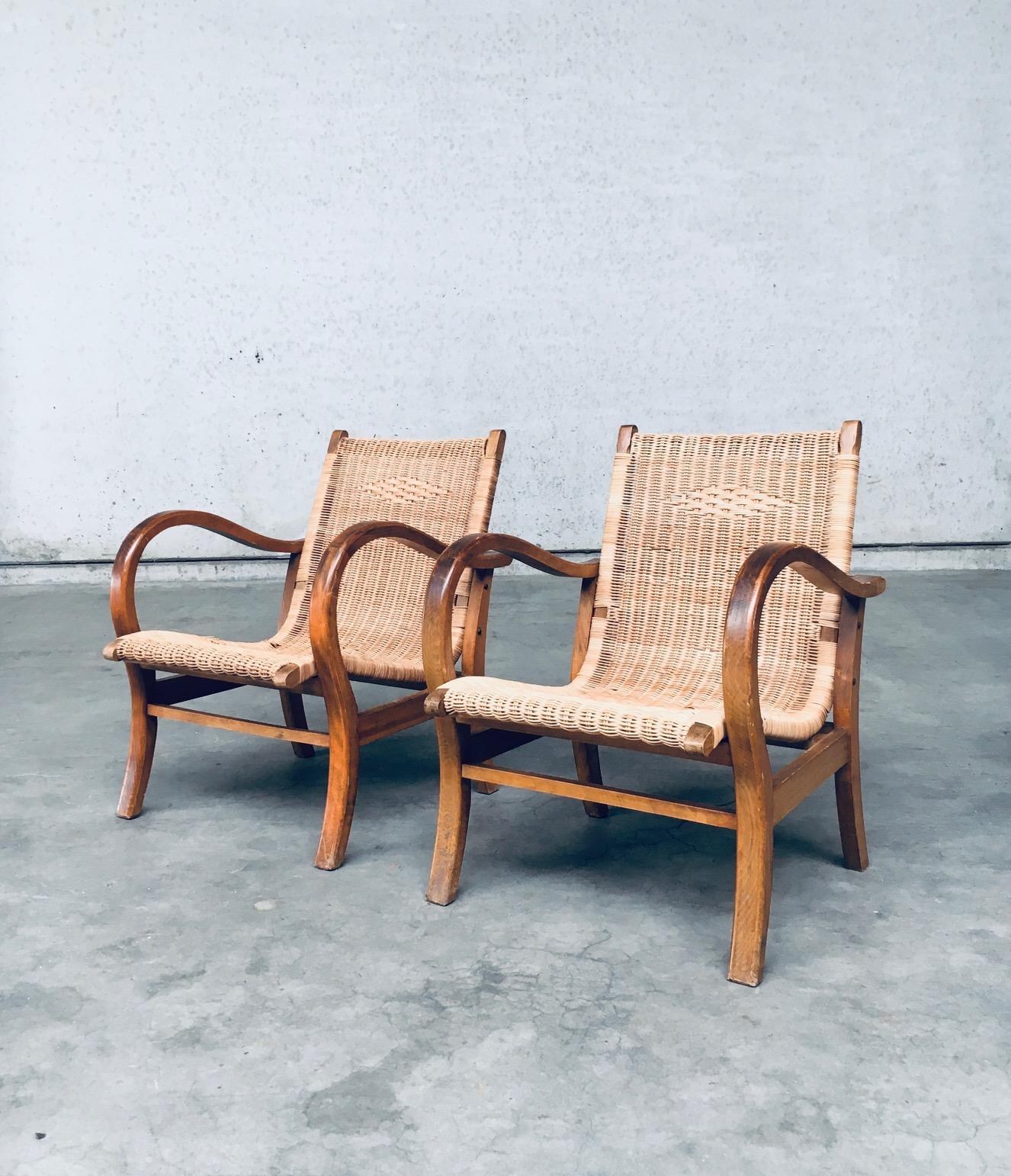 Vintage Bauhaus Design Lounge Chair 2er-Set. Entworfen von Erich Dieckmann. Hergestellt in den 1930er Jahren, Deutschland. Dampfgebogener Buchenholzrahmen mit Sitz und Rückenlehne aus geflochtenem Rattan. Der Stock hat einige kleinere Schäden, die