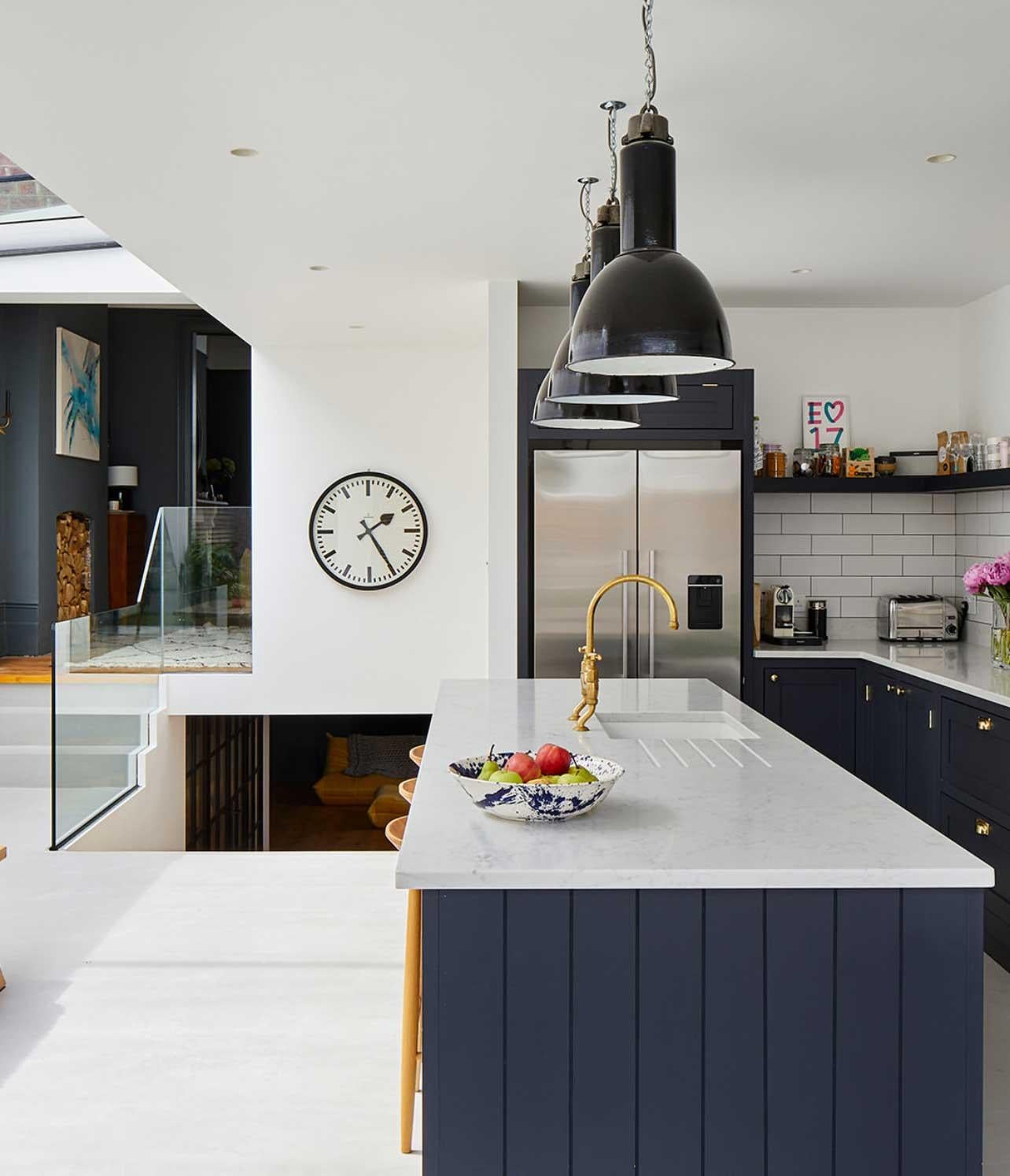 This striking pendant dates to the 1930s and originates from a German industrial facility — a true piece of functional design history. The lamp features a spun-steel reflector finished in black vitreous enamel, complemented by a lacquered steel