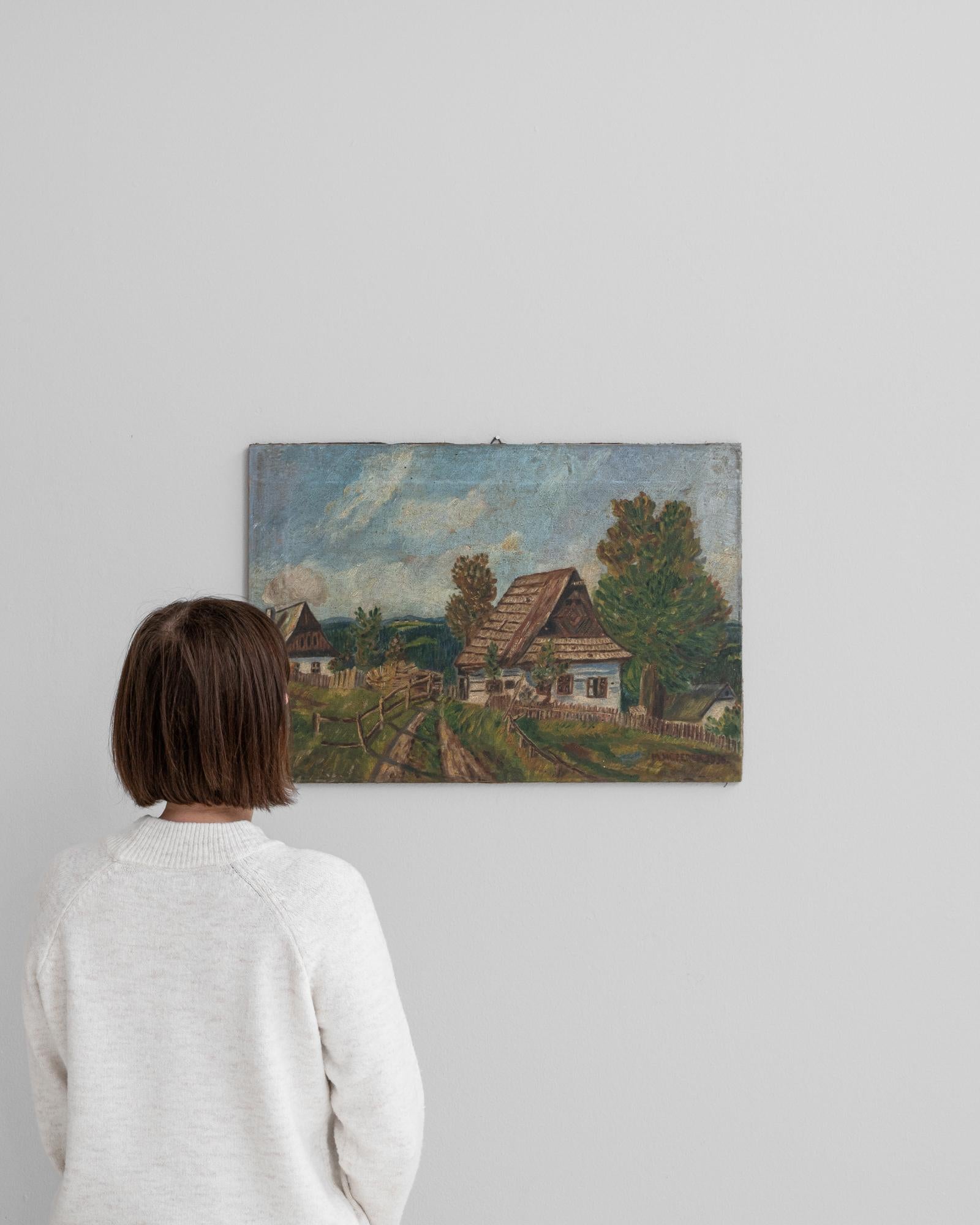 Discover the rustic charm of the Belgian countryside with this exquisite 1930s painting. Capturing the serene beauty of rural life, this artwork features quaint farmhouses nestled among lush, verdant fields under a sweeping sky. The vivid