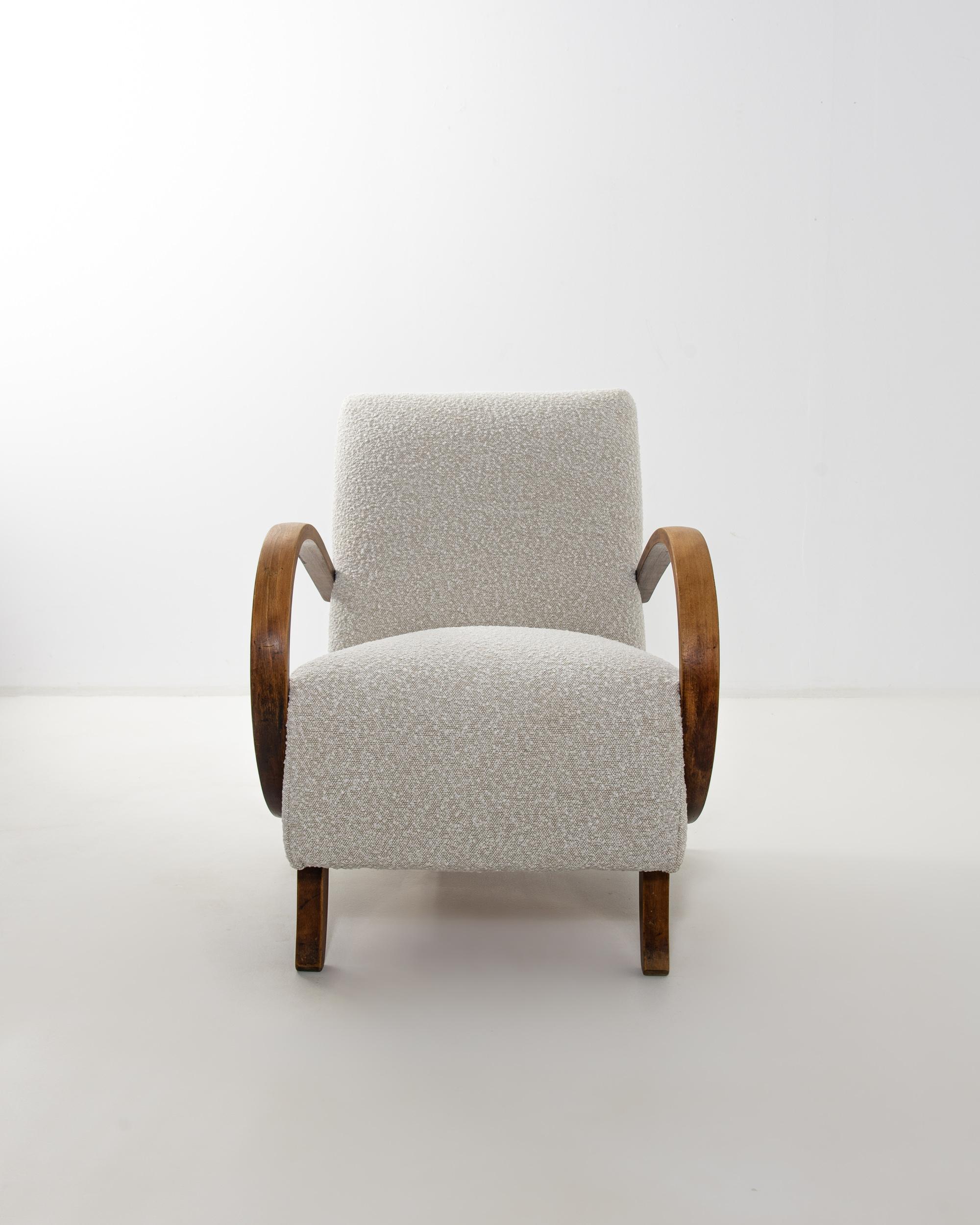 Classic bentwood combines with reupholstered white bouclé in this iconic design by J. Halabala. The chair’s curving legs and bentwood armrests dream up the dynamism of the piece. Contemporary fabric was chosen to enhance the sumptuous shape of the