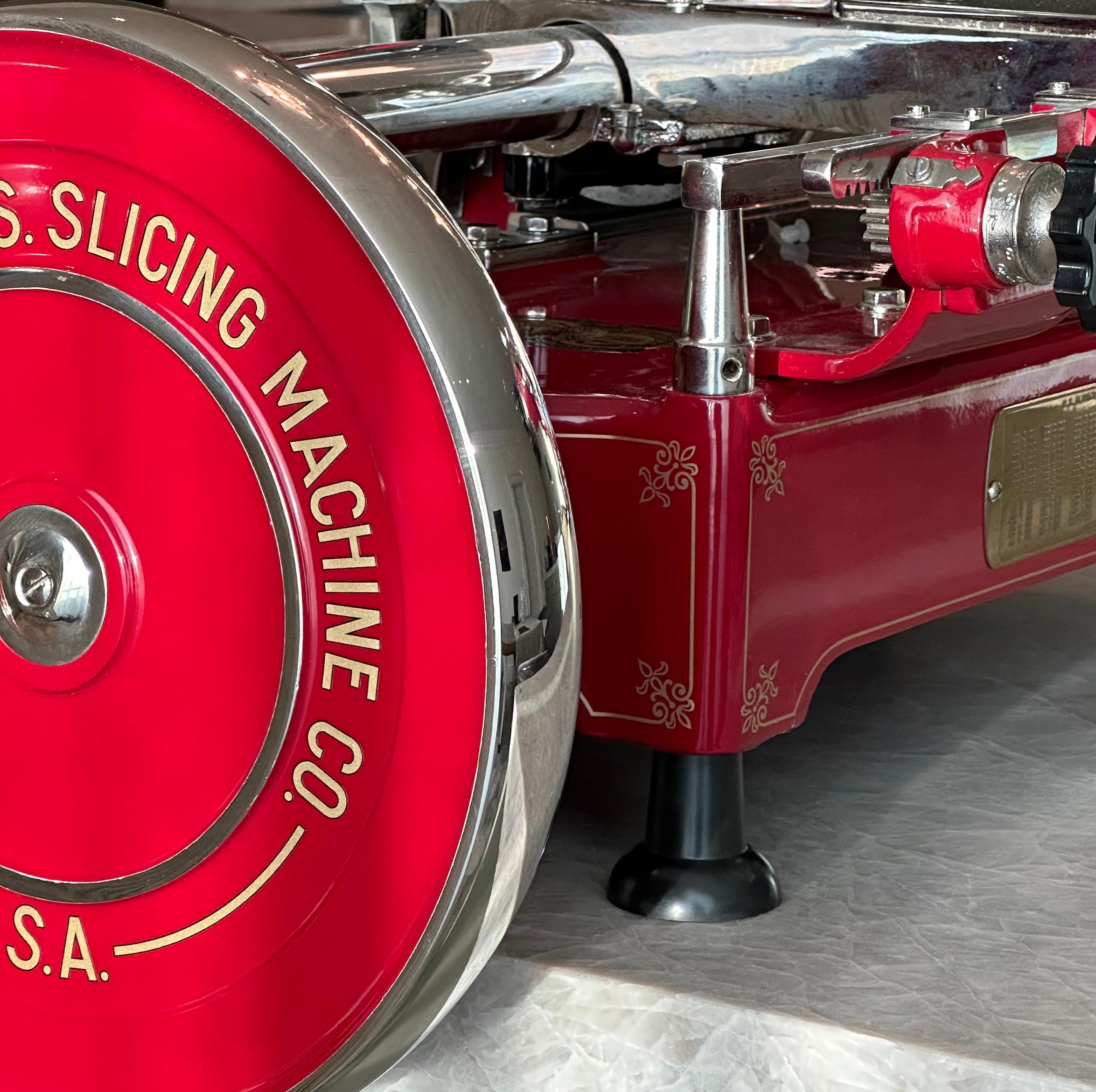 A fully restored and original 1930s Berkel red enamel flywheel meat slicer.

Experience the pinnacle of antique culinary machinery with this impeccably restored Berkel meat slicer. All elements of this piece have been meticulously restored to the