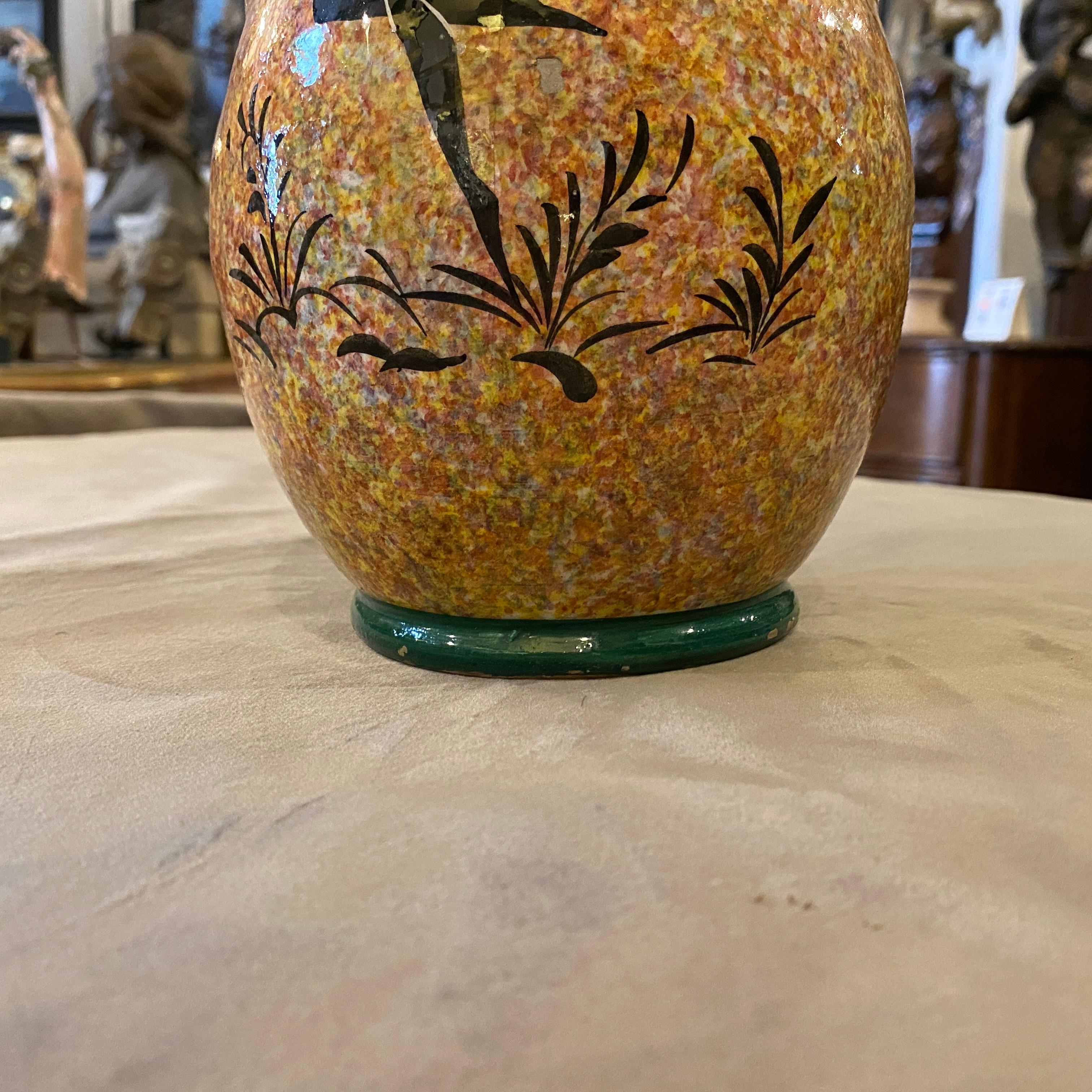 An Art Deco vase designed and manufactured in Italy in the Thirties by Bitossi. The vase has a dancer figure decoration. It has signs of use and age visible on the photos