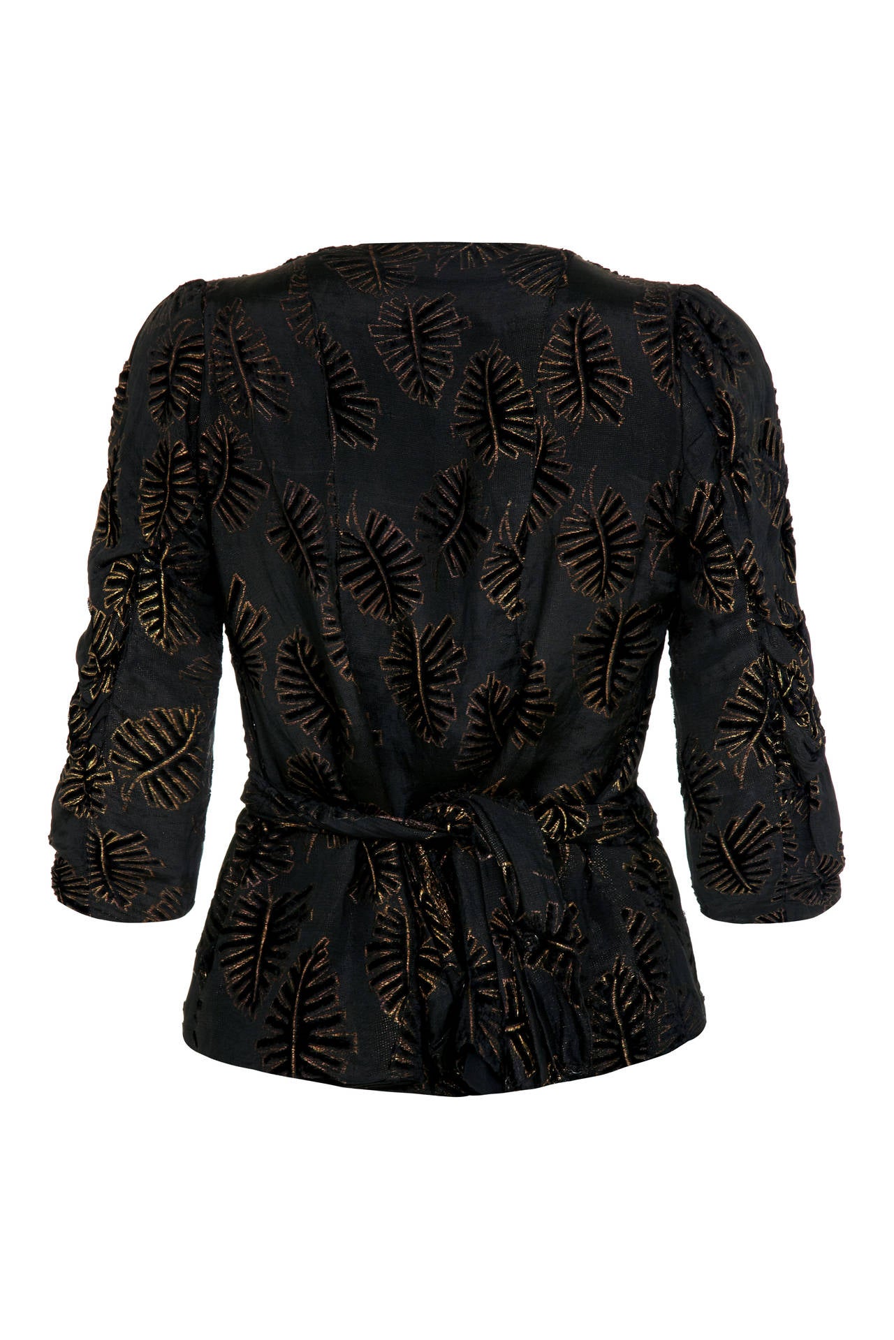 This incredible black and gold lame woven top with embossed black velvet leaf pattern is a beautiful example of 1930s occasion wear but could just as easily be worn over jeans such is the versatility of the piece.  Featuring ¾ sleeves and pretty