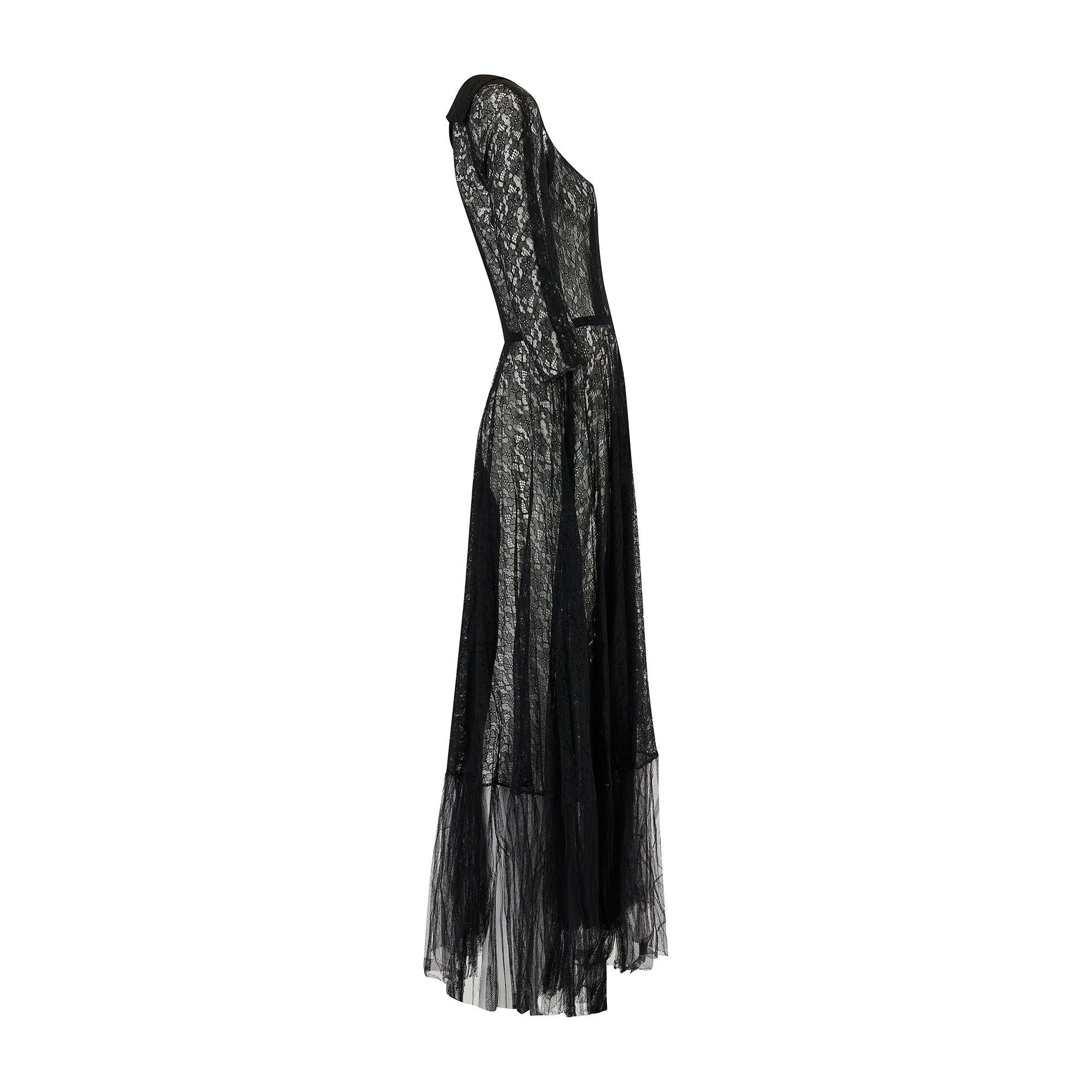 This beautiful black lace maxi dress was made in the late 1930s. Gowns of this era are extremely collectable, particularly when they’re in such rare excellent condition. It is tailored from inky black machined lace with no lining, it has a sheer