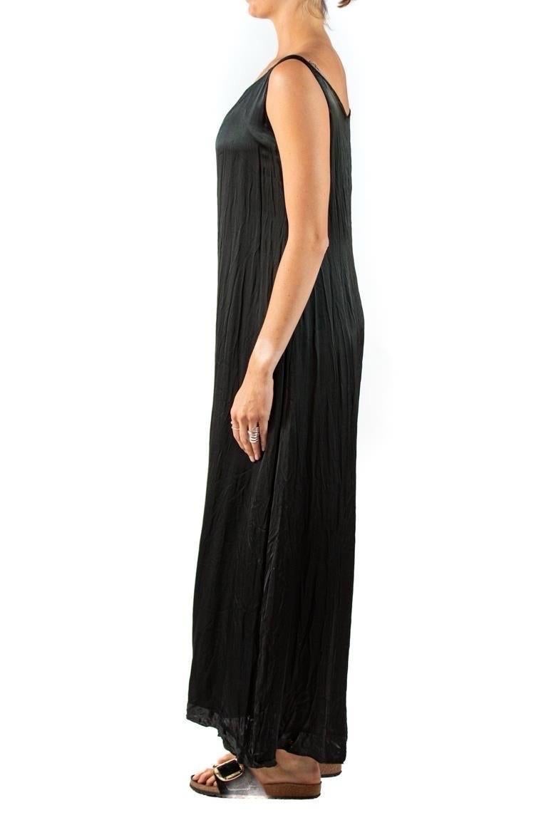 Priced as-is with some fading and pin holes throughout 1930S Black Silk Satin Dress With Patina 