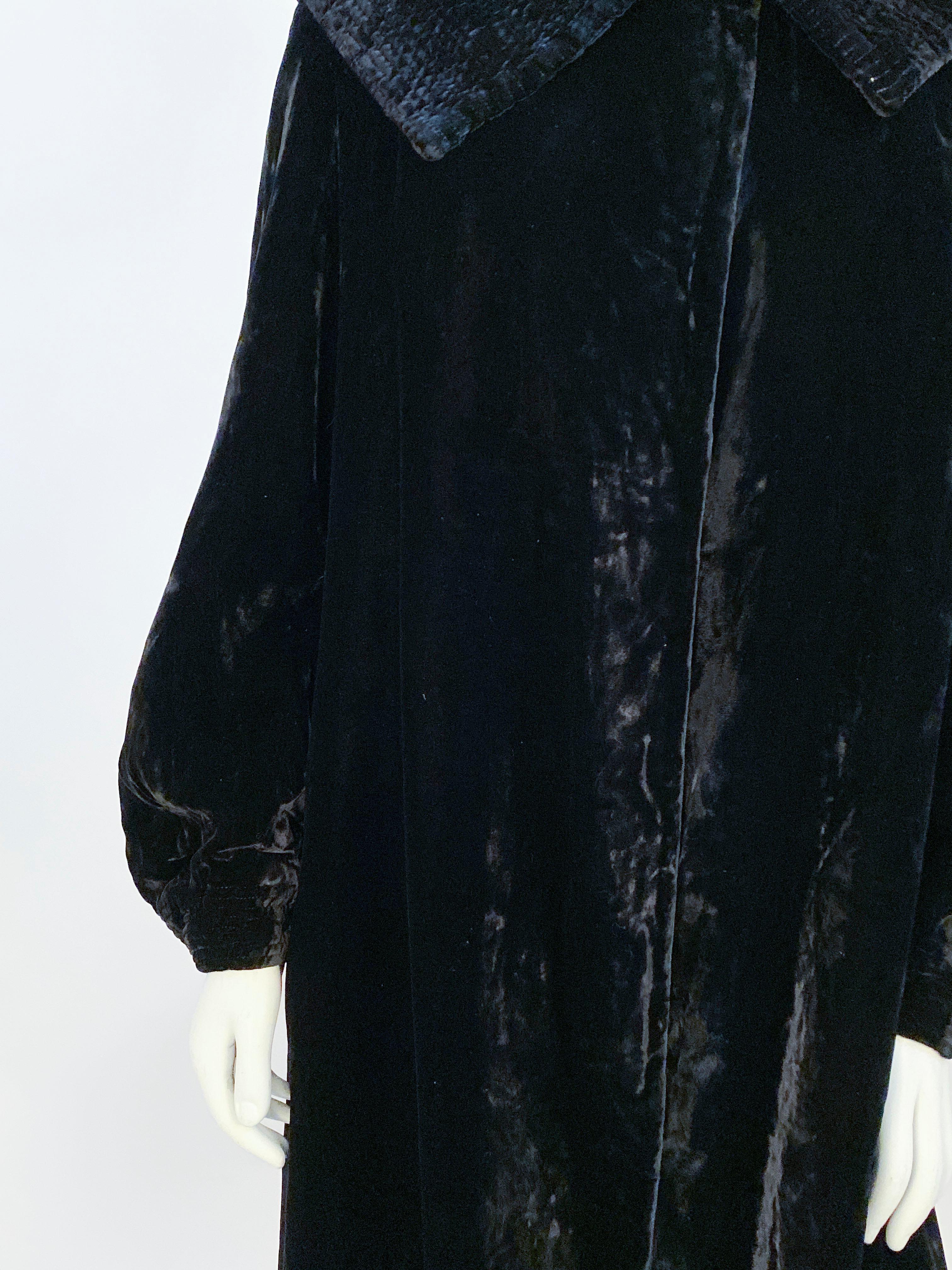 1930s Black silk velvet coat with full bell sleeves, ruched cuffs, oversized collar, and an off-white lining. 