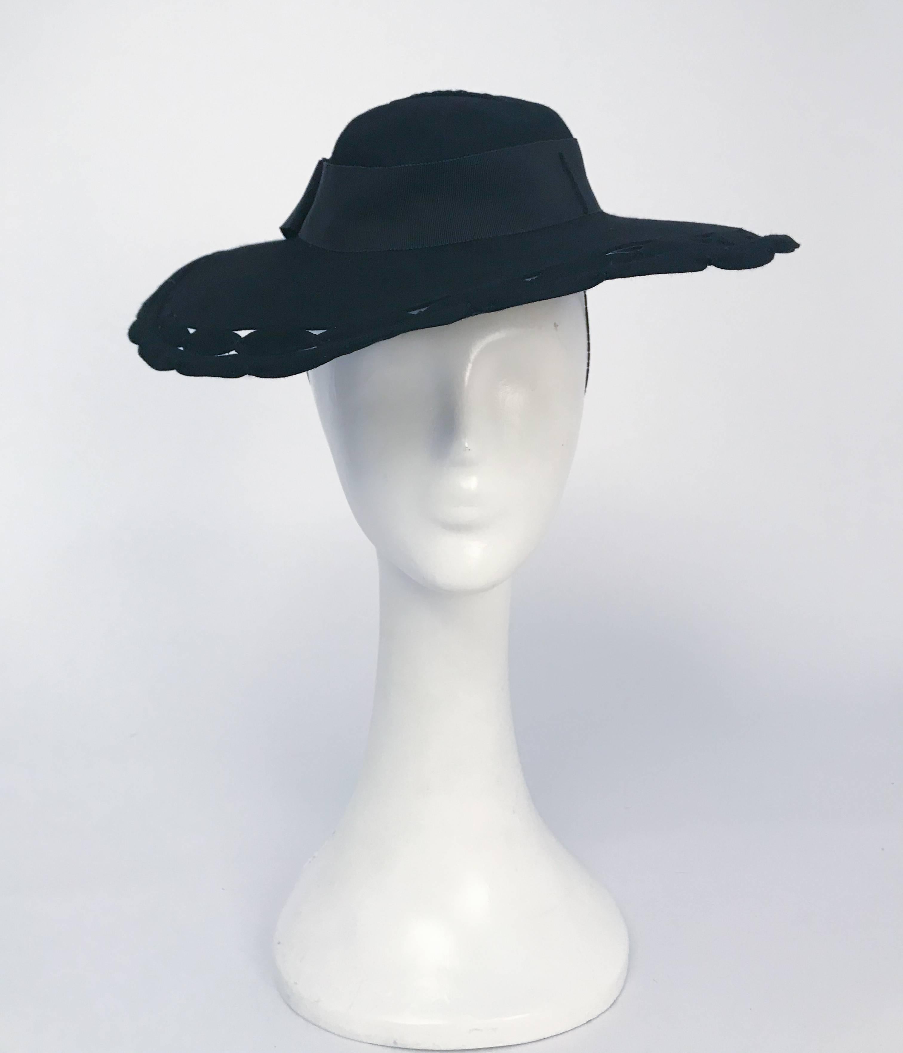 1930s Black Wide Brim Hat w/ Scalloped Brim & Cutouts. Held to head w/ elastic band and inner comb.