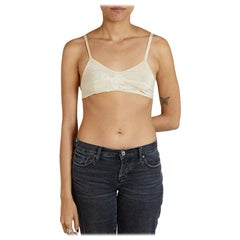 Reggiseno di seta rosa antico con fiori ricamati a mano