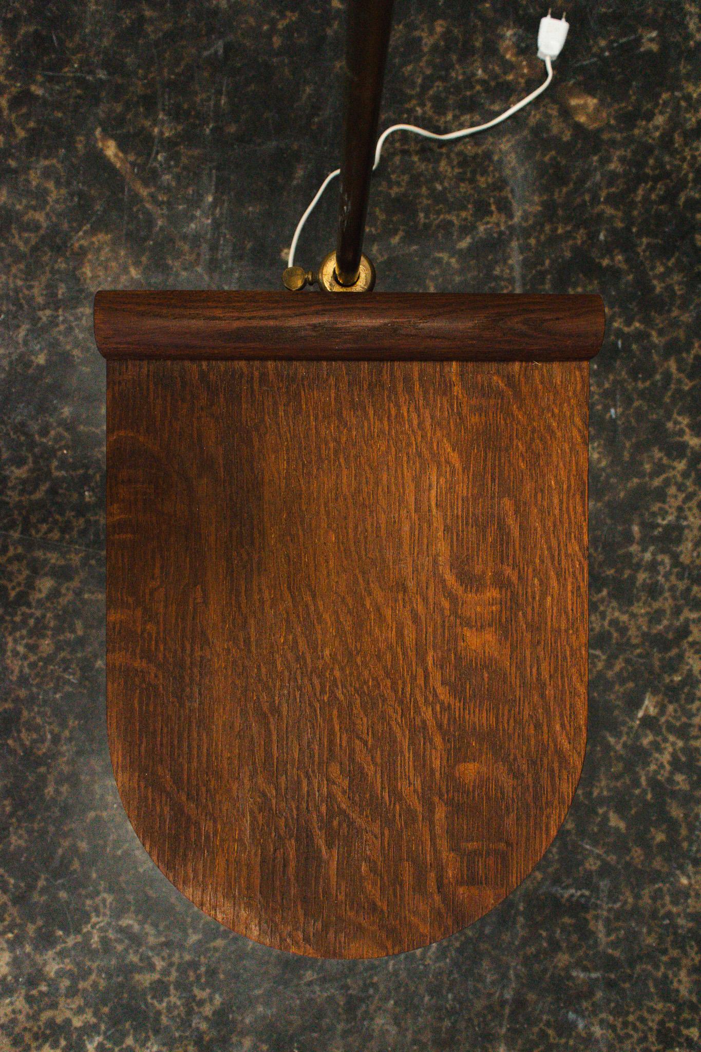 Vintage French Floor lamp with smoking table from the 1930's. The piece is in great vintage condition with minor ware to the wood from use. Shade is new and in perfect condition. The lamp is adjustable in height, and wired for the US. 

Wood side