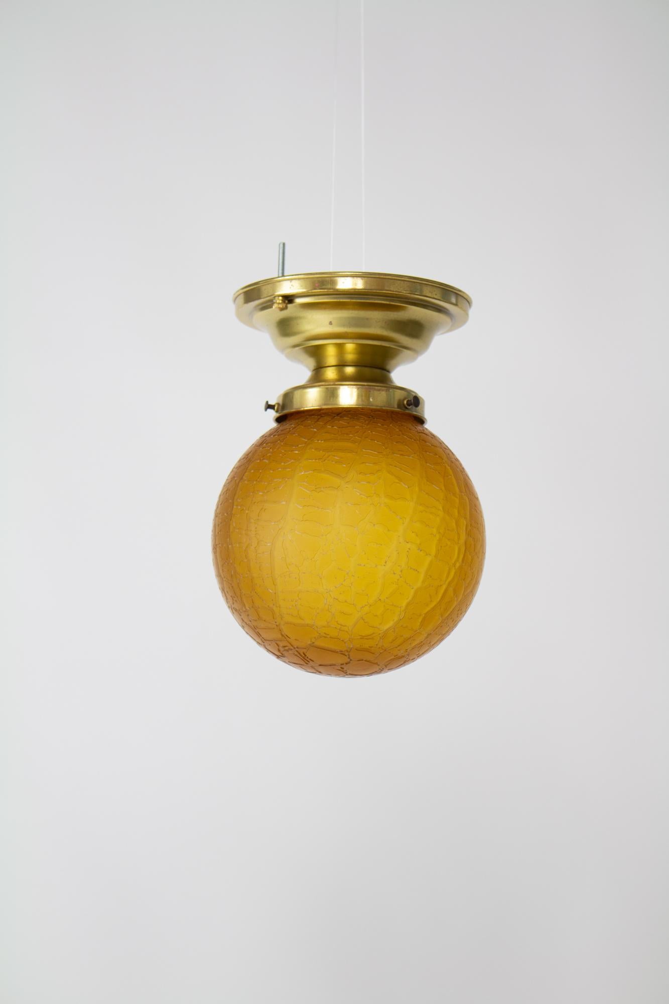 American 1930’s Brass Flush Mount Fixture with Amber Crackle Glass For Sale