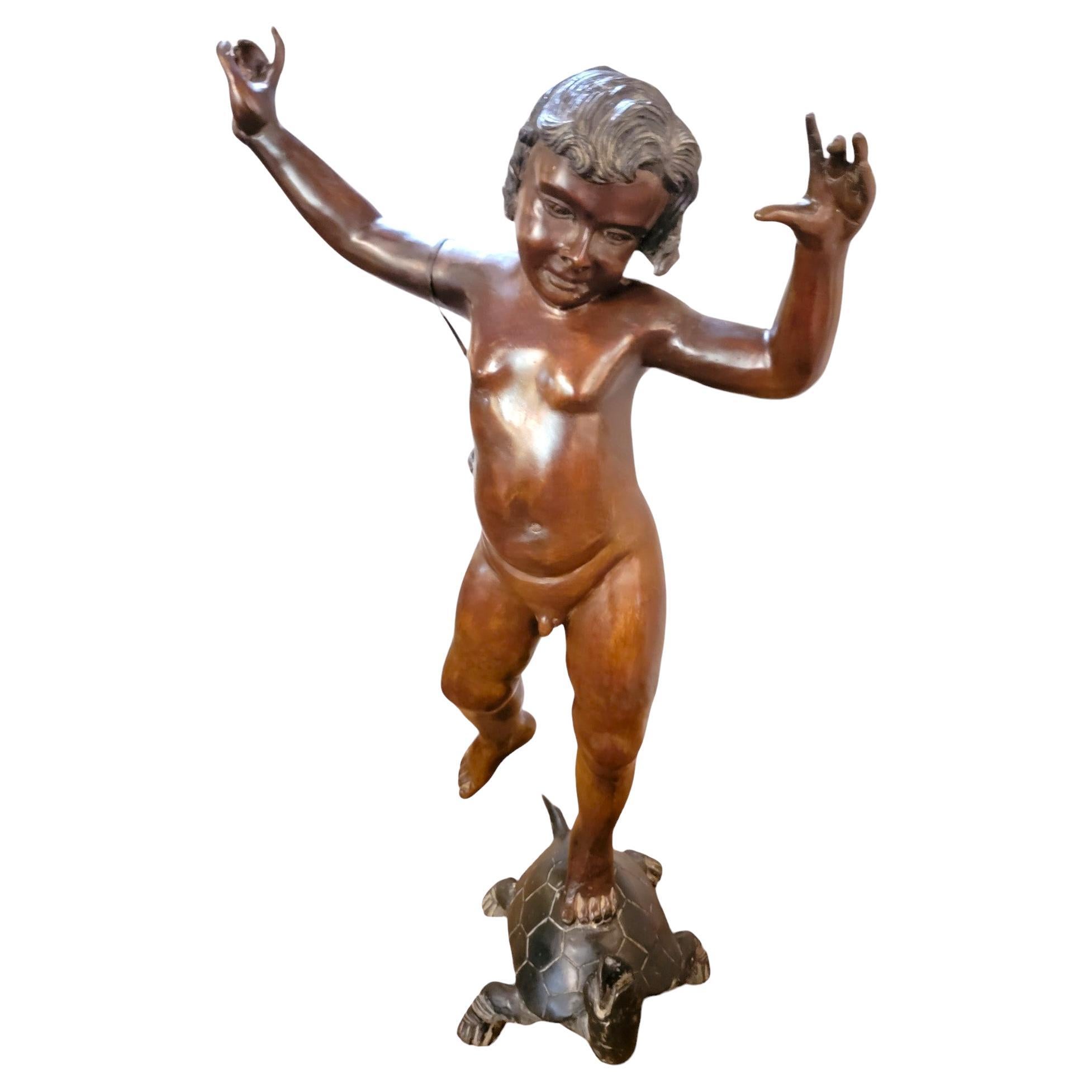 Sculpture de fontaine en bronze des années 1930 représentant un garçon chevauchant une tortue