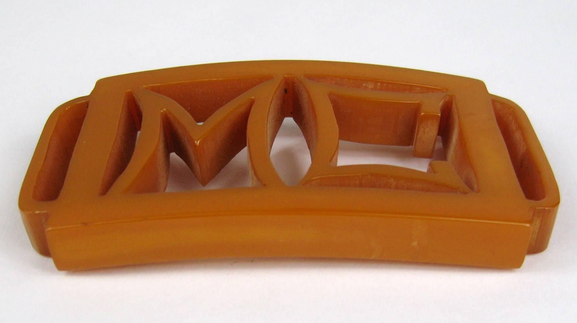 Stunning early Bakelite / Catalin Belt Buckle, Hand Carved. Initials are M C. This is a true piece of bakelite circa 1930's. It measures 3.65 inches x 2 inches. This is out of a massive collection of Hopi, Zuni, Navajo, Southwestern, sterling