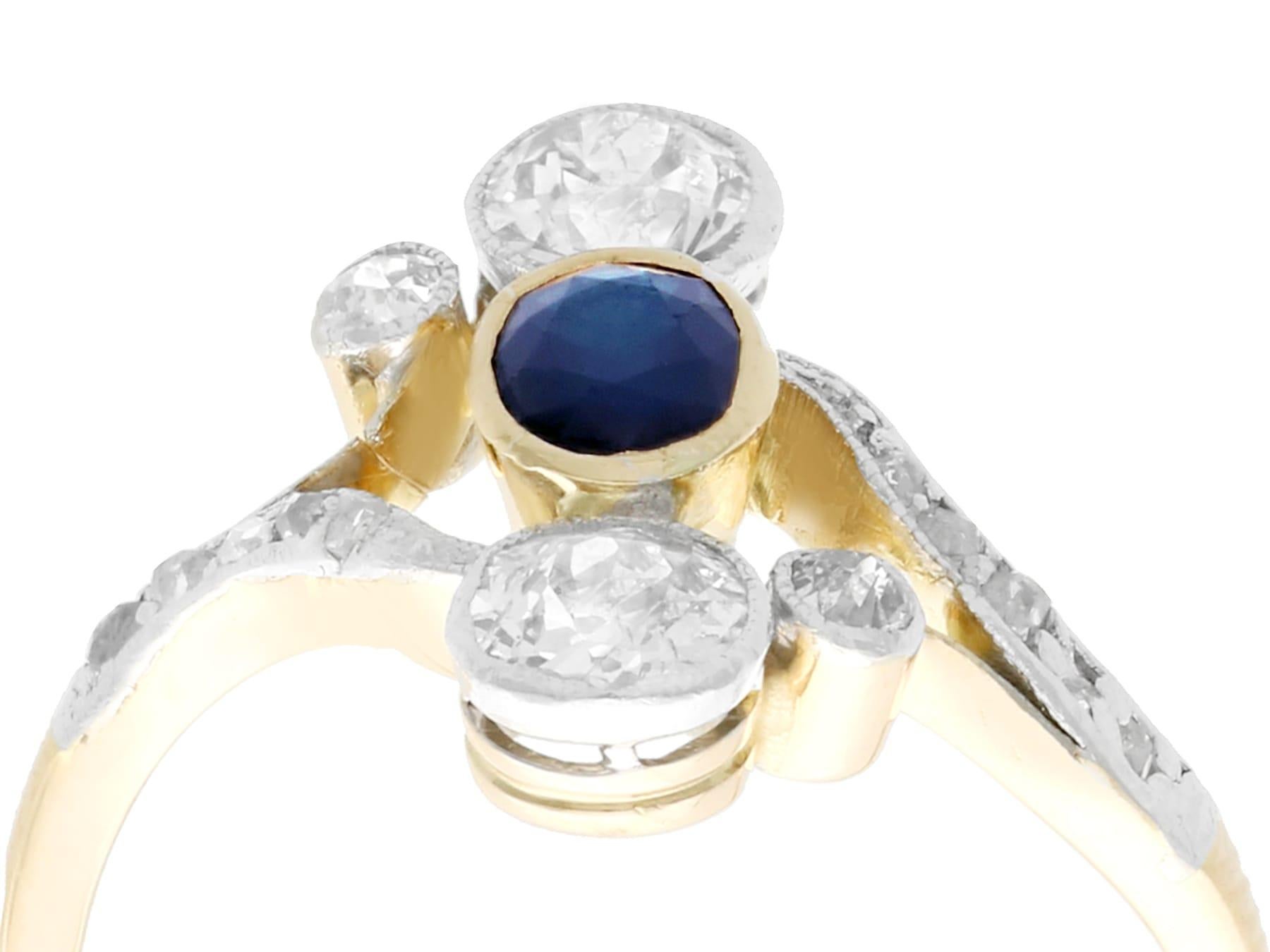 An impressive 0.37 carat sapphire and 0.83 carat diamond, 14 karat yellow gold and 14 karat white gold twist ring; part of our diverse antique jewelry collections.

This fine and impressive sapphire and diamond ring has been crafted in 14k yellow