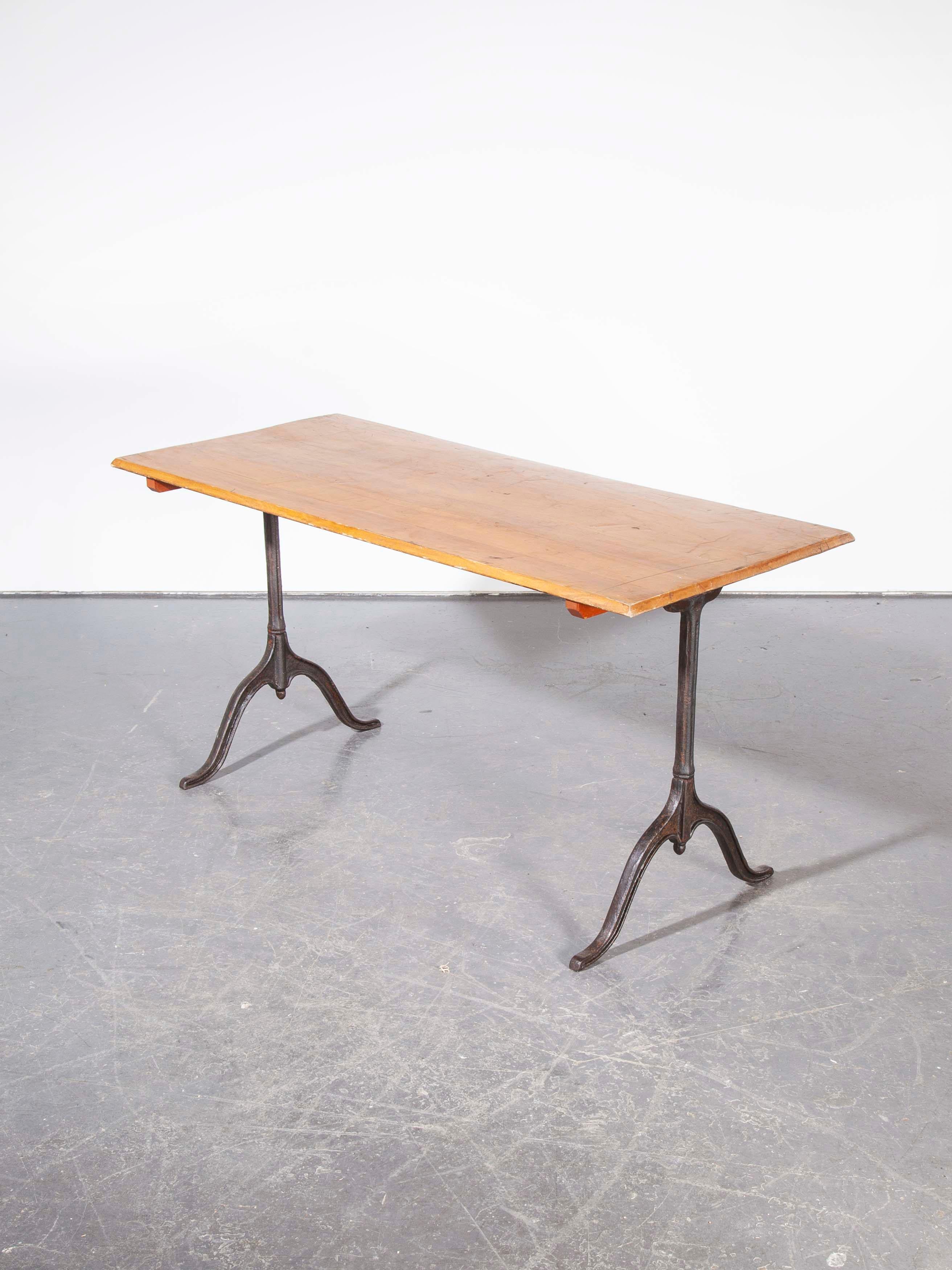1930s cast metal base Kronenbourg café dining – bistro table – model two. Four tables are available, this is a listing for one table as photographed. Sourced from the original Kronenbourg site in Alsace, these were found languishing in a disused