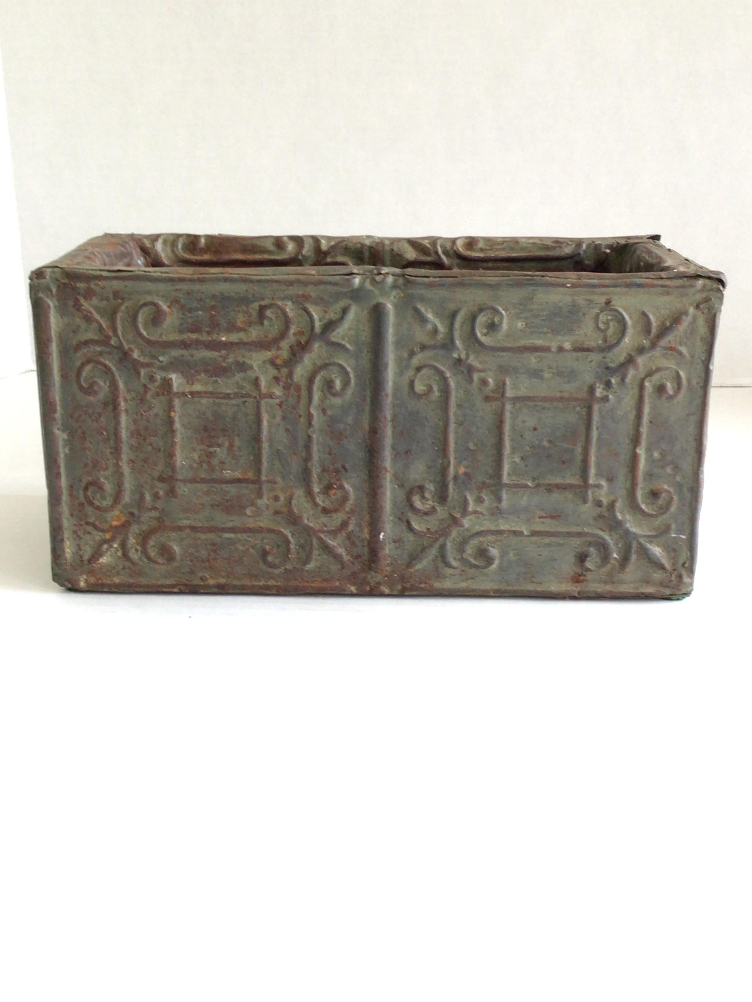 This 1930s Ceiling Tin Window Box / Cistern is the perfect container for houseplants to add architectural elements to a modern or traditional interior
wood frame inside
Tin nailed to wood  