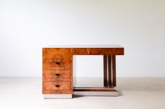 1930's Center desk in walnut root and polished metal profiles
