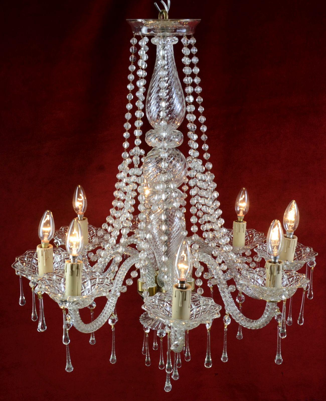 Wonderful chandelier made in the style of Marie Terese. This item comes from Spain from the 1930s.

It was made with the utmost care. From the inside comes eight arms, which are made of transparent glass, and each of them is finished with a