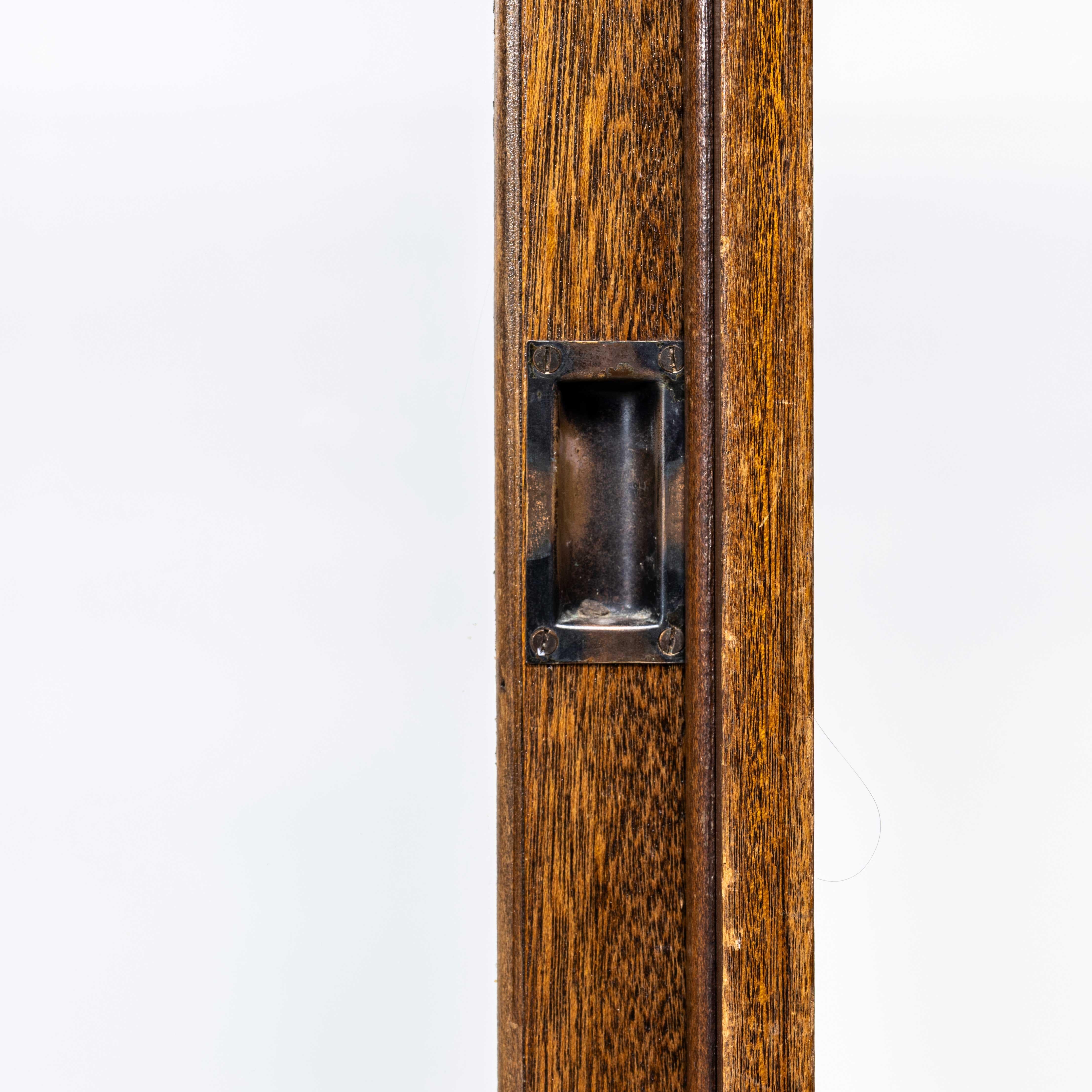 1930’s Compact English Haberdashery Display Cabinet. 

Good sized practical shop display cabinet. The cabinet is solid oak throughout with good colour and age, the back opens with two sliding doors that open freely and inside there is a letter