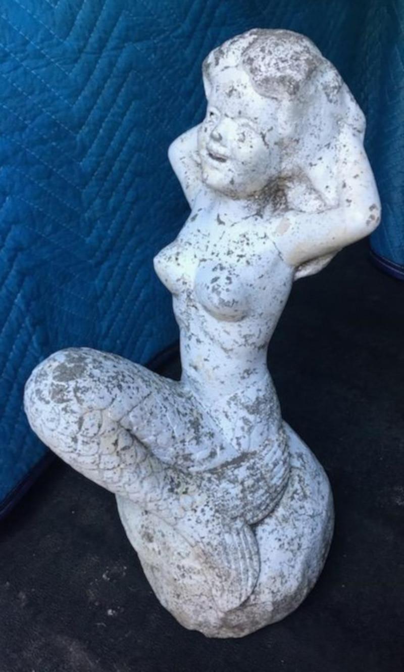 Painted concrete mermaid from Old Beach House in as found condition. This painted mermaid has worn and aged painted surface.