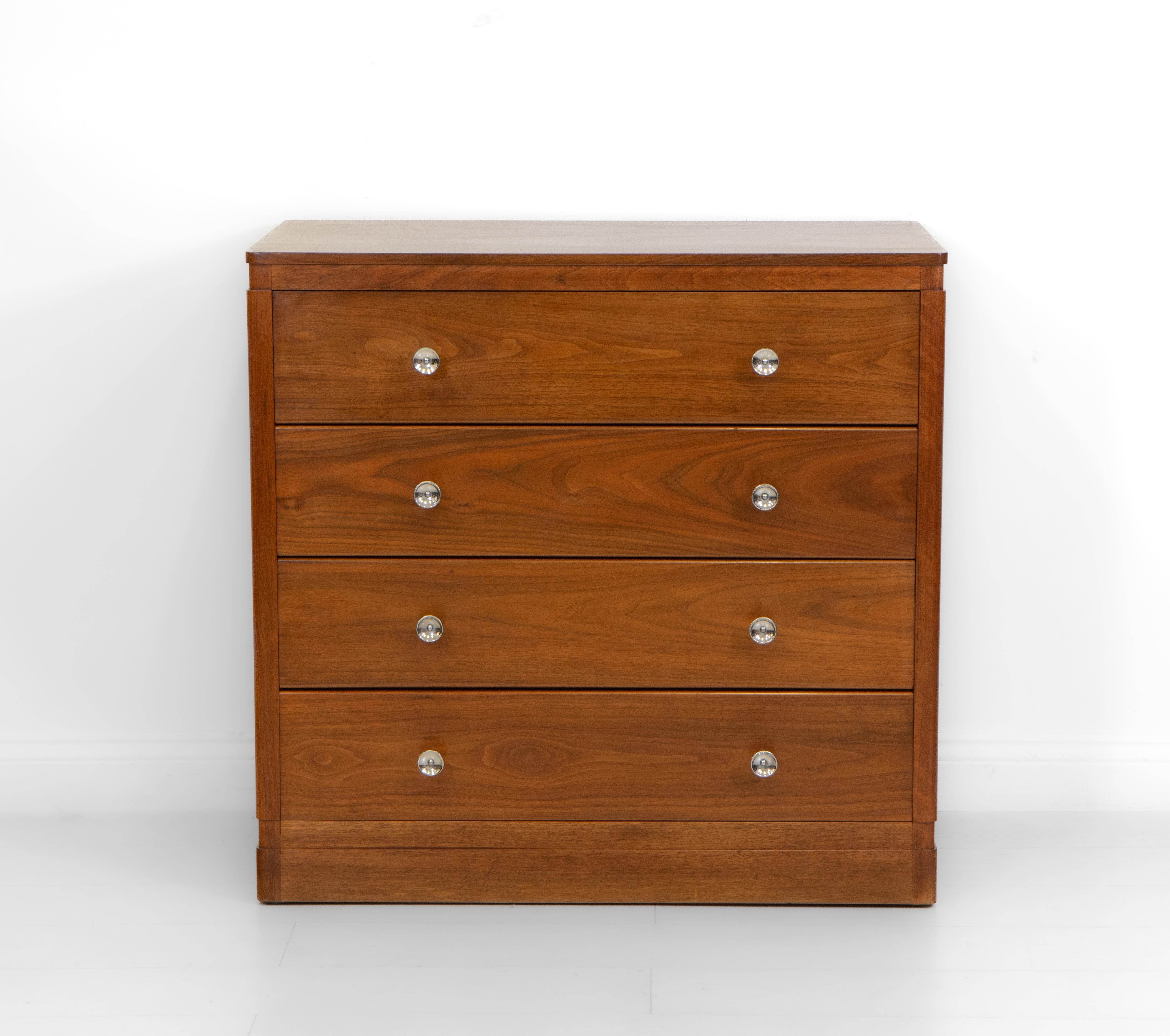 
A Cotswold walnut chest of drawers from the ‘Shipton’ suite, designed by W.H.Russell for Gordon Russell Ltd in 1930. 

Superbly constructed in American black walnut, with chromed handles. Nicely proportioned with simple detail. It has has been