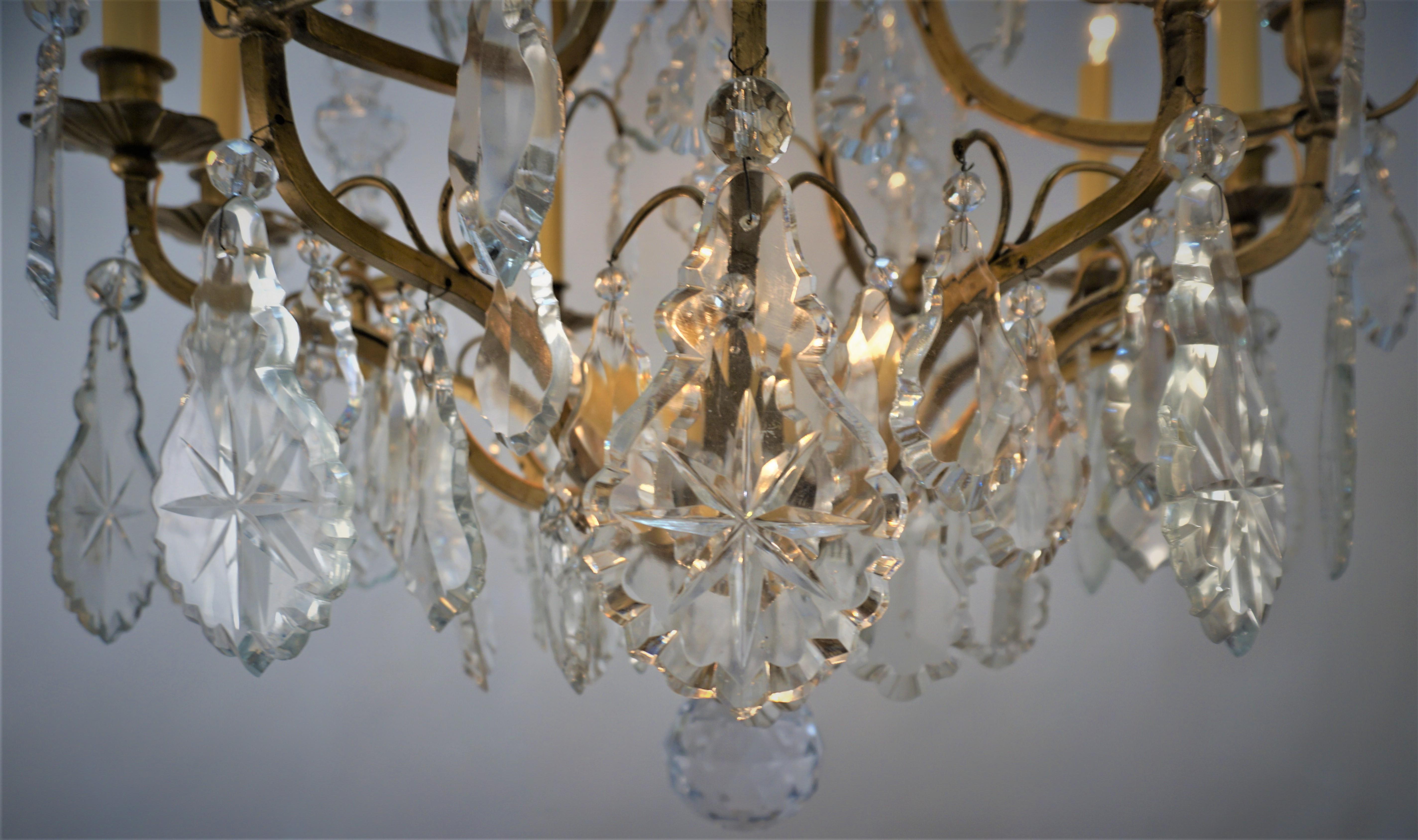 French 1930s Crystal and Gilt Metal Twelve Light Chandelier