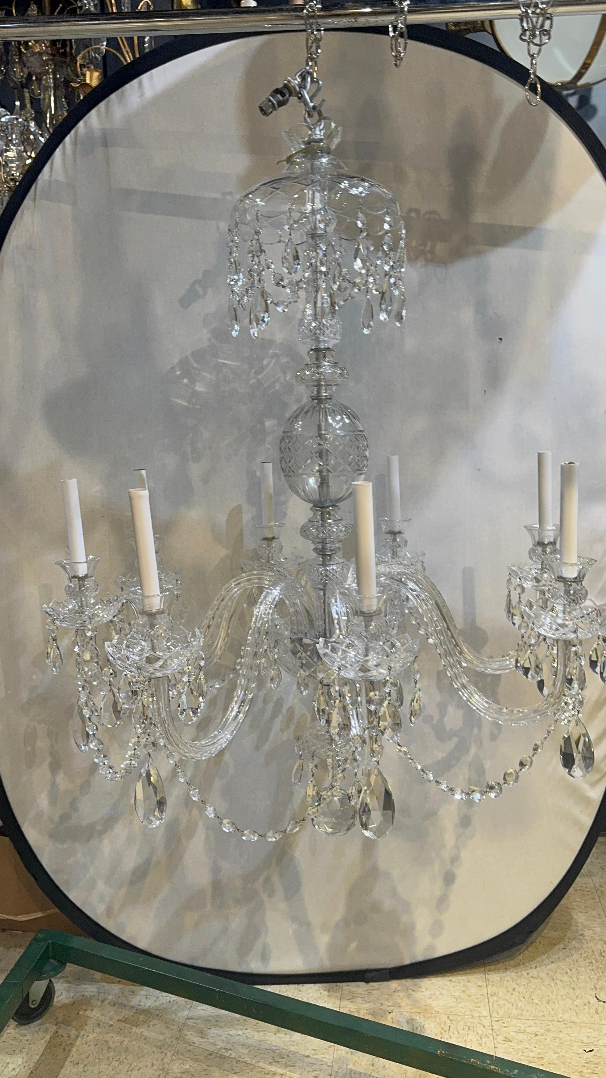 
Circa 1930’s English 8 lights cut crystal chandelier with crystal hangings.