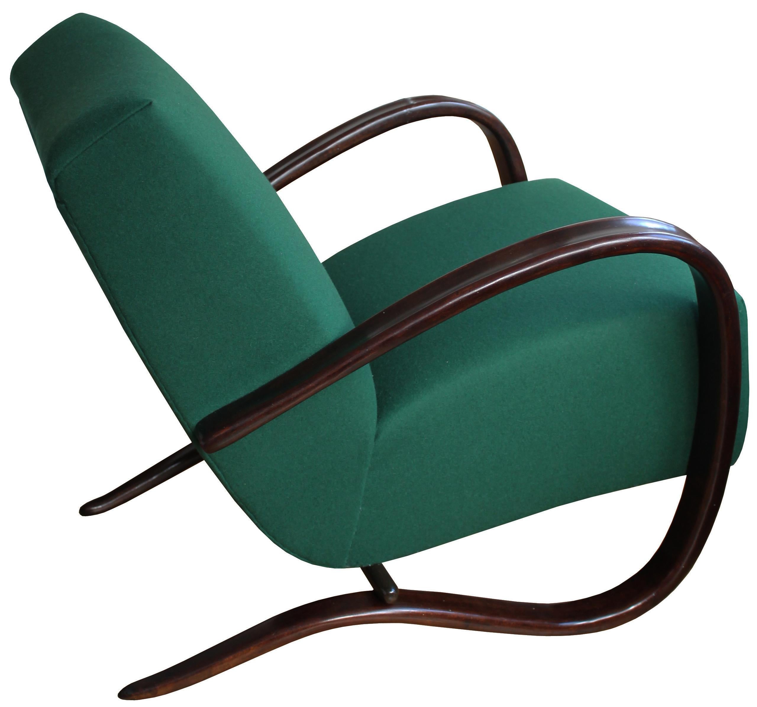 Probably the most famous 20th century Czech piece of furniture, this H 269 armchair was originally designed in 1933 by Jindrich Halabala for the legendary brand UP Brno and is now a true icon.

The main design feature is the two continuous