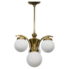 1930s Czechoslovak Art Deco Brass Chandelier with Four Opaline Glass Globes