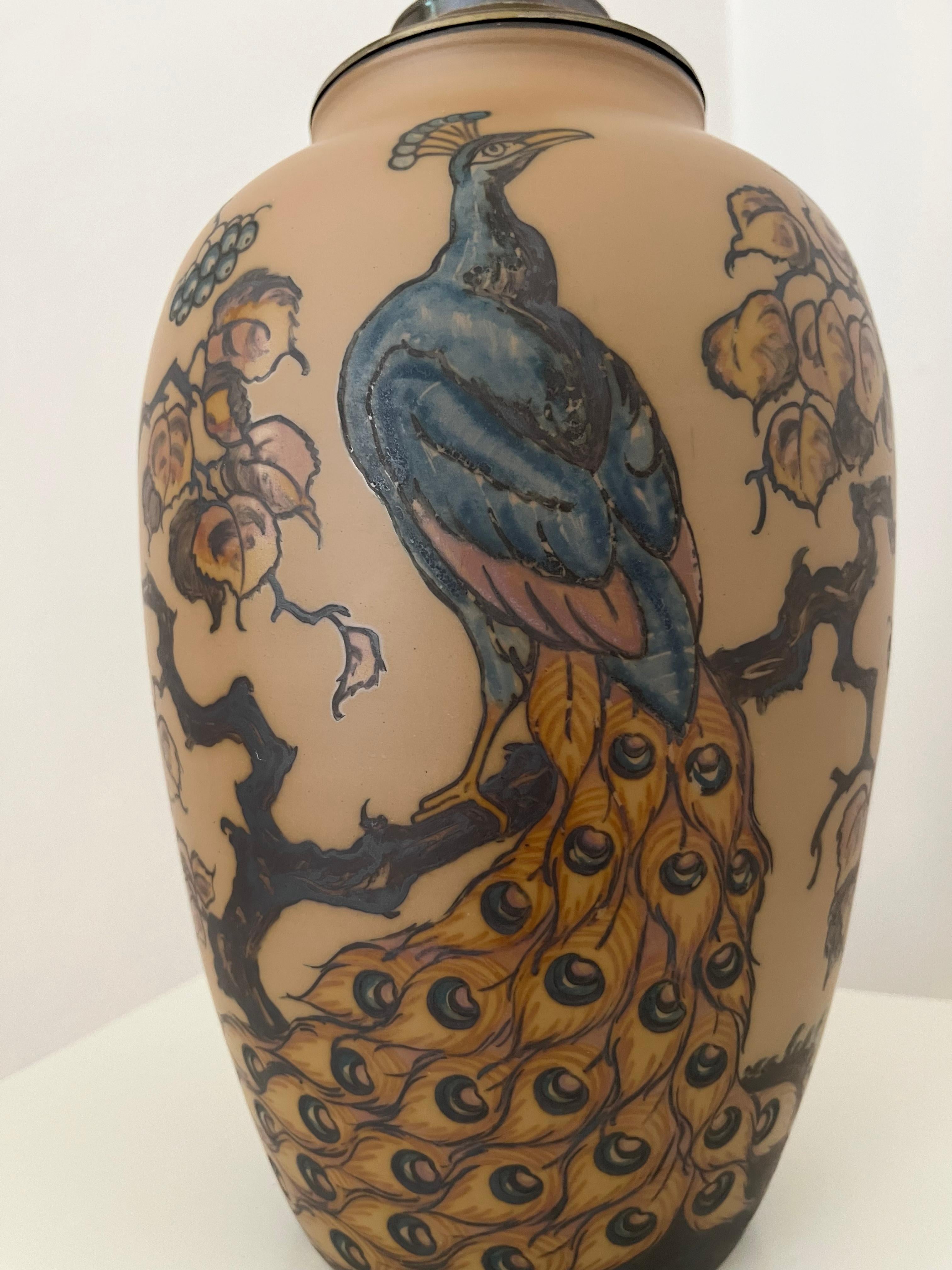 1930s Danish art nouveau ceramic table lamp decorated with peacock by L. Hjort In Good Condition In Frederiksberg C, DK