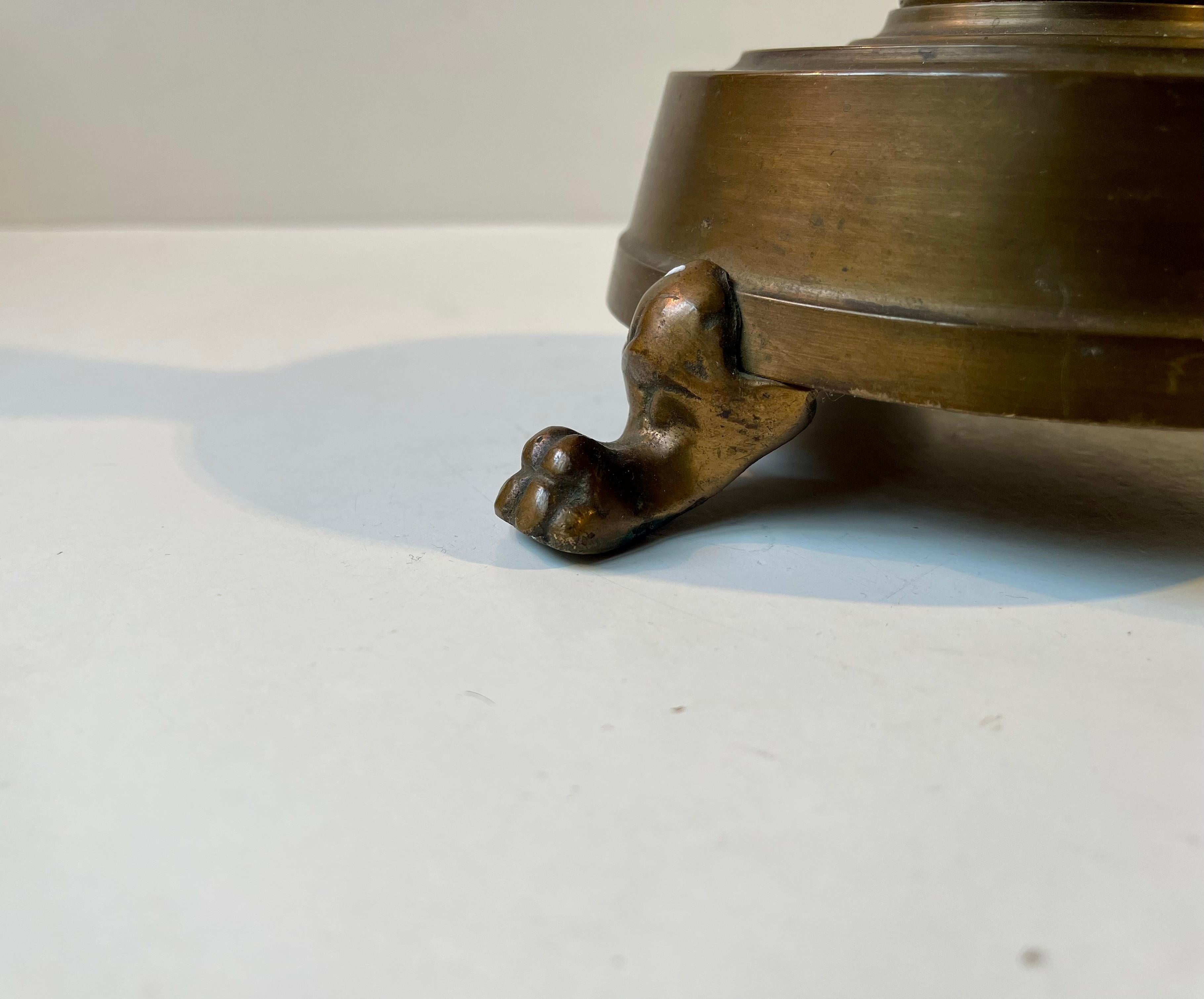 Patinated 1930s Danish Lion Paw Bronze Table Lamp with Pink Shade For Sale