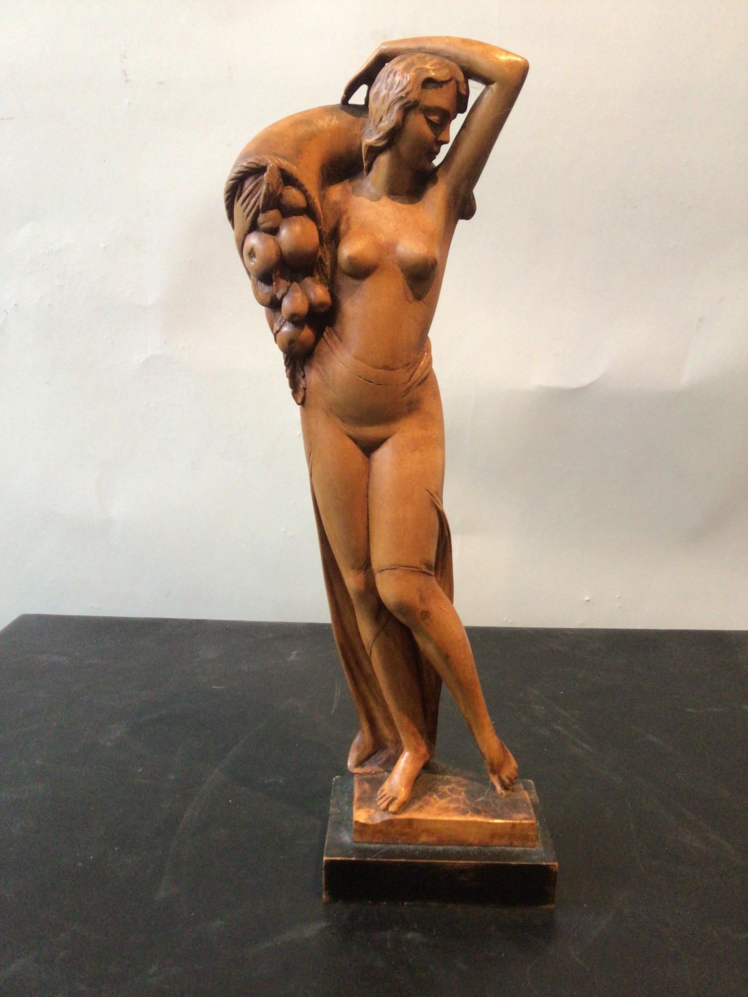 1930s carved wood sculpture of female.