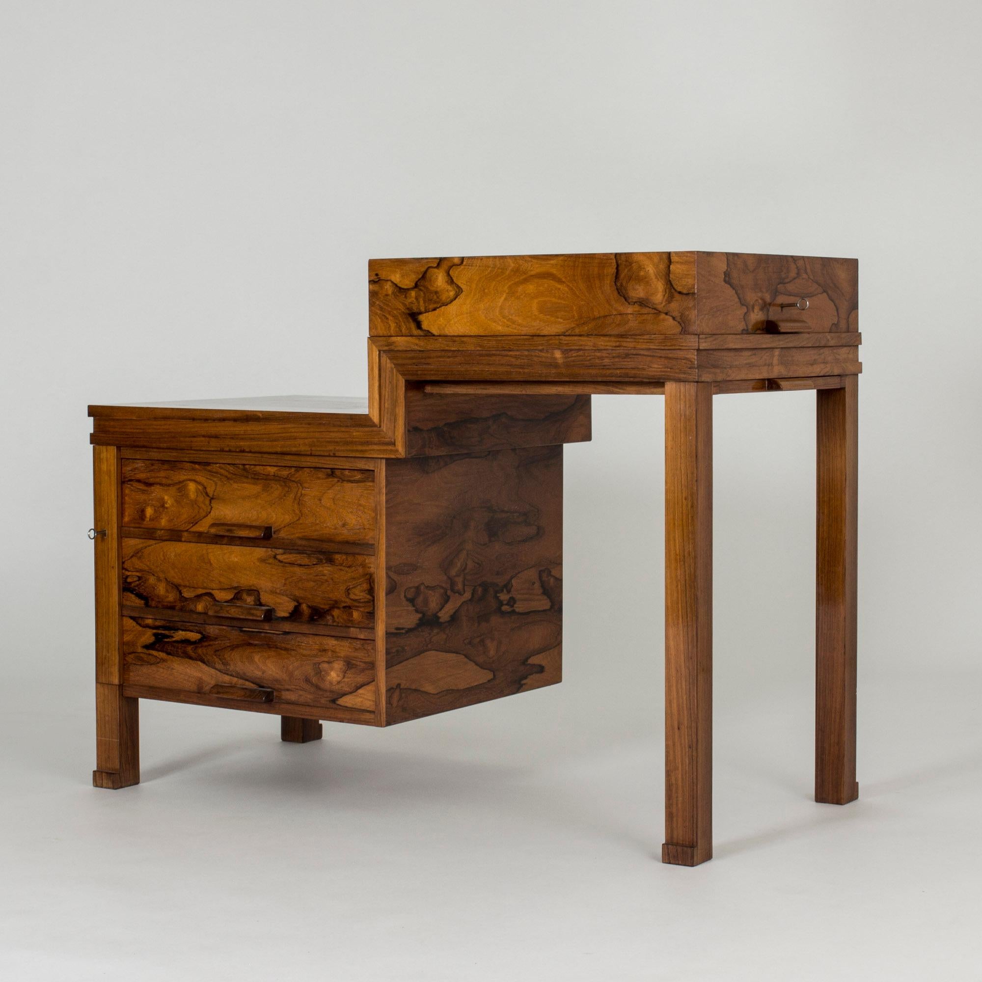 Stunning rosewood desk by Carl Hörvik, commissioned by and made for the Stockholm Exhibition in 1930 and an outstanding example of that period’s luxurious functionalism. The top opens up to reveal a turquoise velvet clad space originally designed to