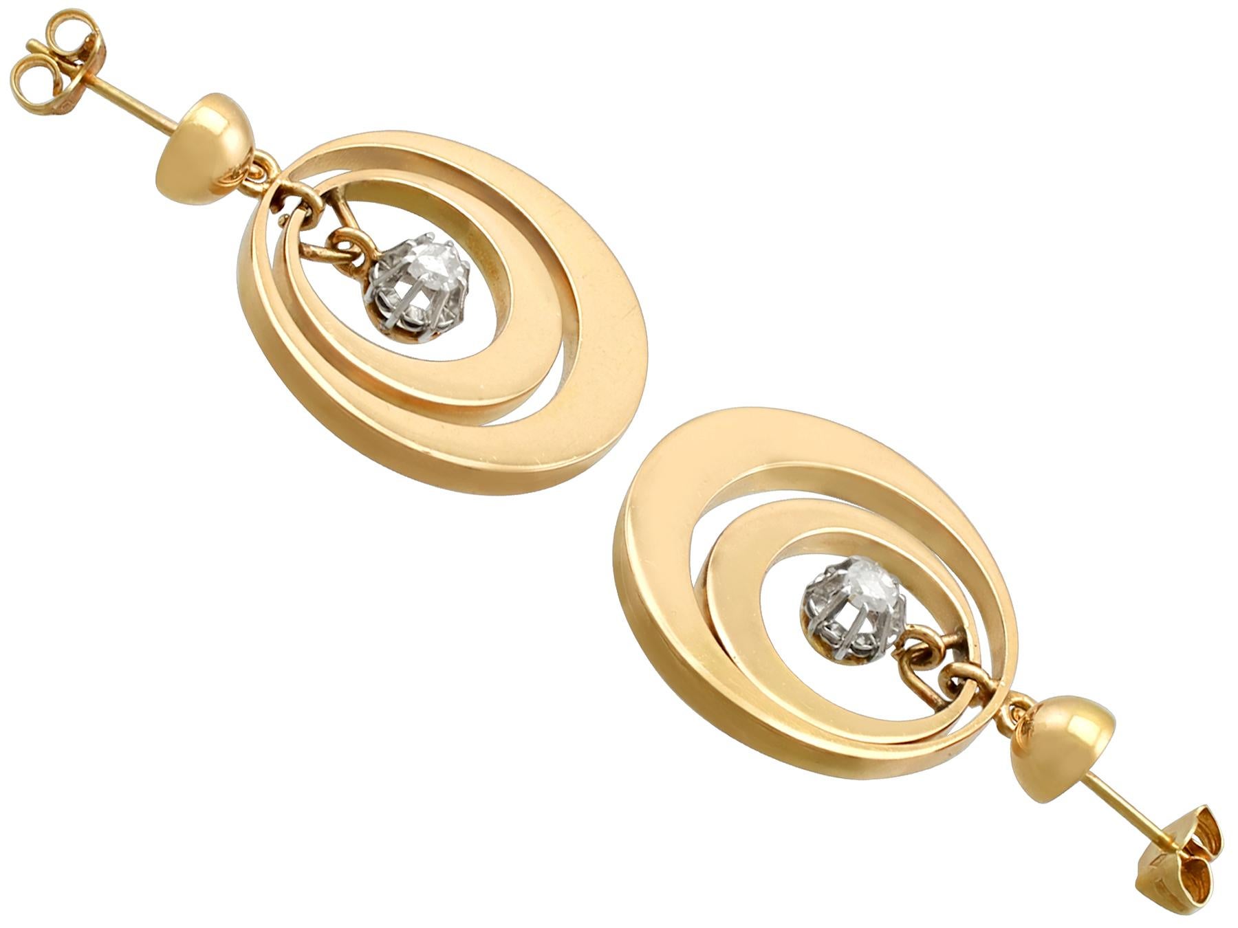 A fine and impressive pair of antique 0.30 carat diamond and 18 karat yellow gold drop earrings; part of our antique jewelry and estate jewelry collections.

These fine and impressive yellow gold drop earrings have been crafted in 18k gold.

Each