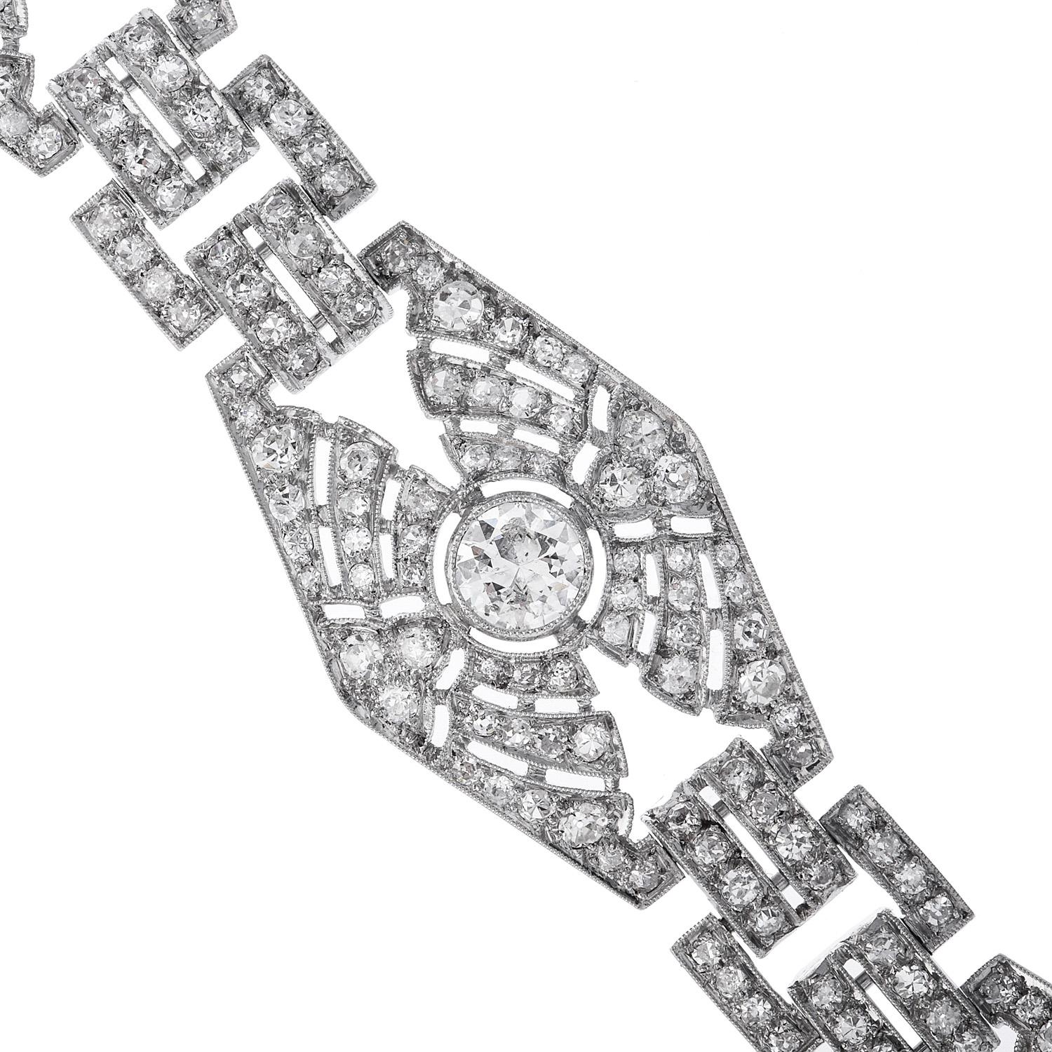 Vintage 1930s Diamond filigree Bracelet, with hexagonal large links.

Crafted in solid Platinum, its center of each link composed of (4) larger round-cut, bezel-set, Diamonds weighing approximately 3.30 carats H-I  color and SI2clarit)

the rest of