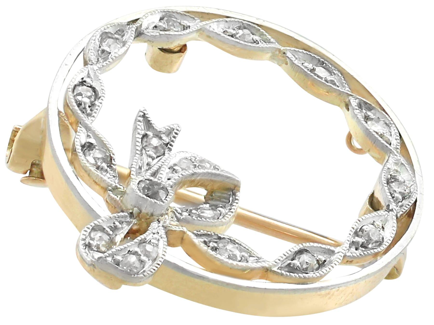 An impressive antique 0.22 carat diamond and 15 karat yellow gold, platinum set wreath brooch; part of our diverse antique jewellery and estate jewelry collections.

This fine and impressive 1930's diamond brooch has been crafted in 15k yellow gold