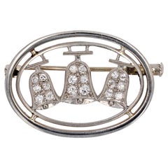 1930s Diamonds 18 Karat White Gold Bells Oval Brooch